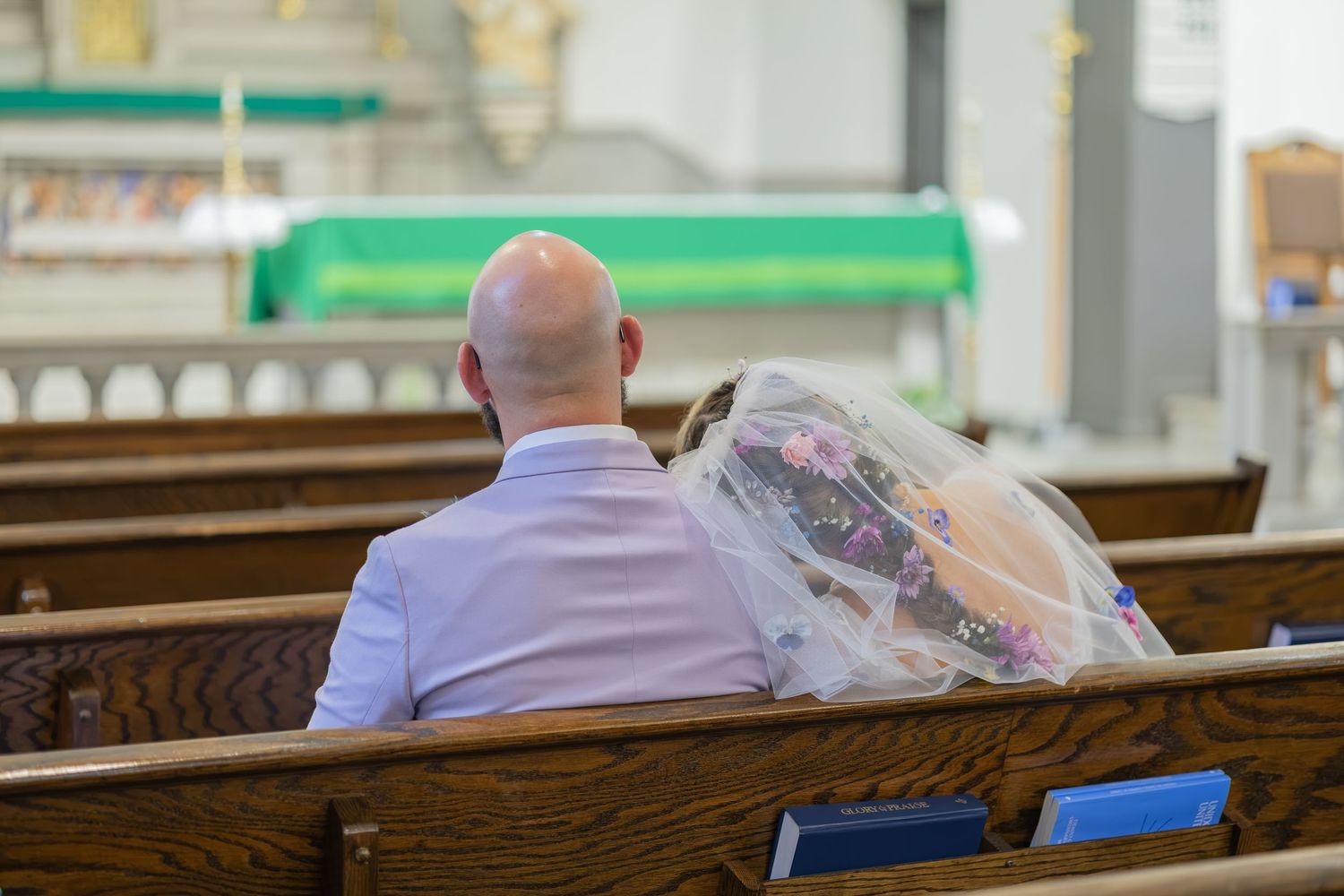 Bride and groom sharing joyful moments on their wedding day with timeless portraits, candid emotions, and elegant details.