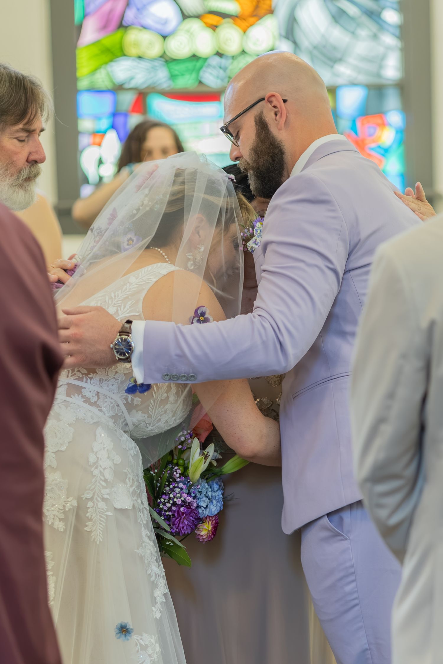 Bride and groom sharing joyful moments on their wedding day with timeless portraits, candid emotions, and elegant details.