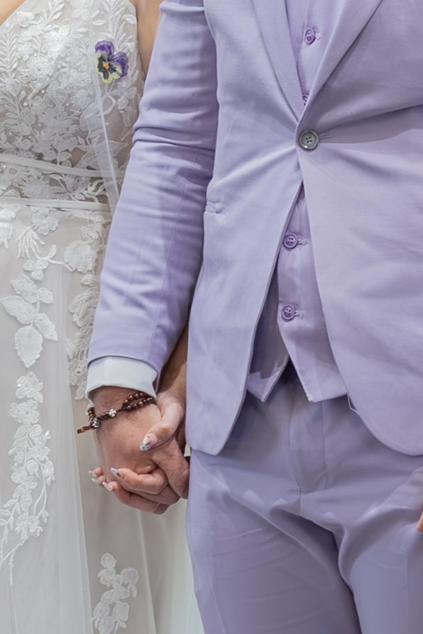 Bride and groom sharing joyful moments on their wedding day with timeless portraits, candid emotions, and elegant details.