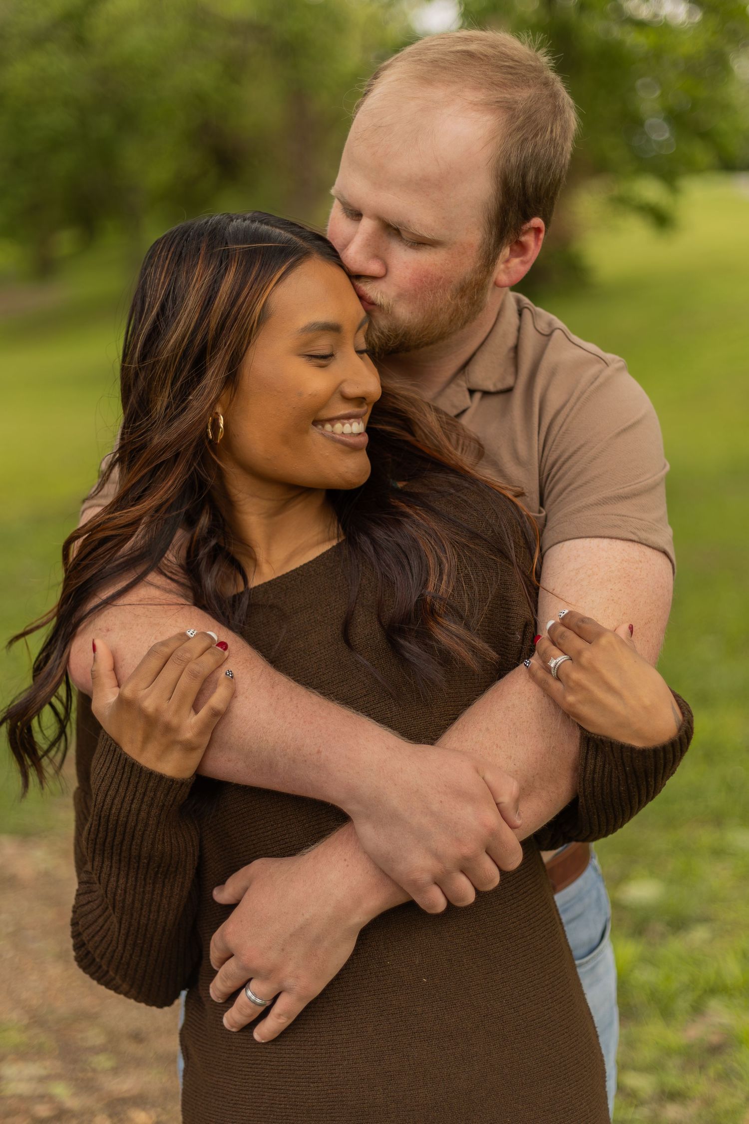 Romantic couples session with candid moments, natural poses, and golden-hour light in a scenic outdoor location.