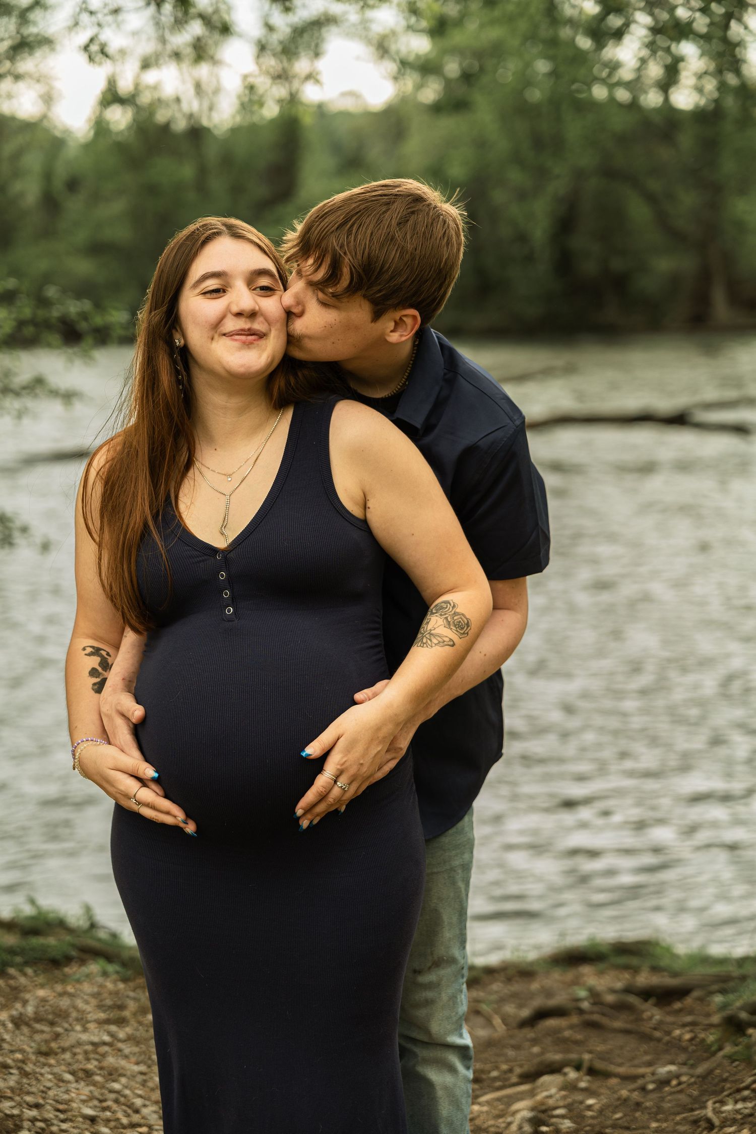 Expecting mother during a maternity session with natural posing, soft light, and timeless portraits celebrating motherhood.