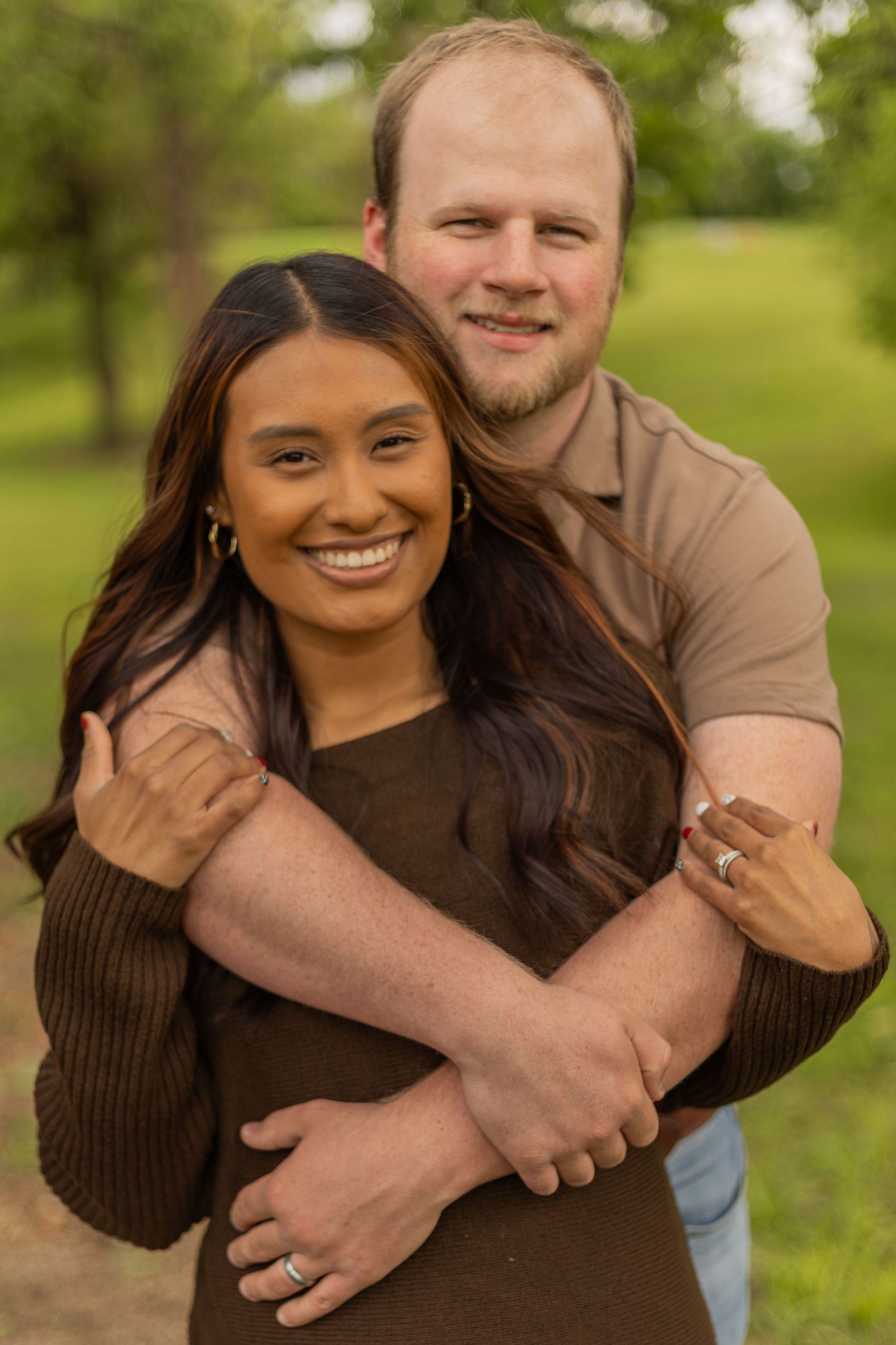 Romantic couples session with candid moments, natural poses, and golden-hour light in a scenic outdoor location.