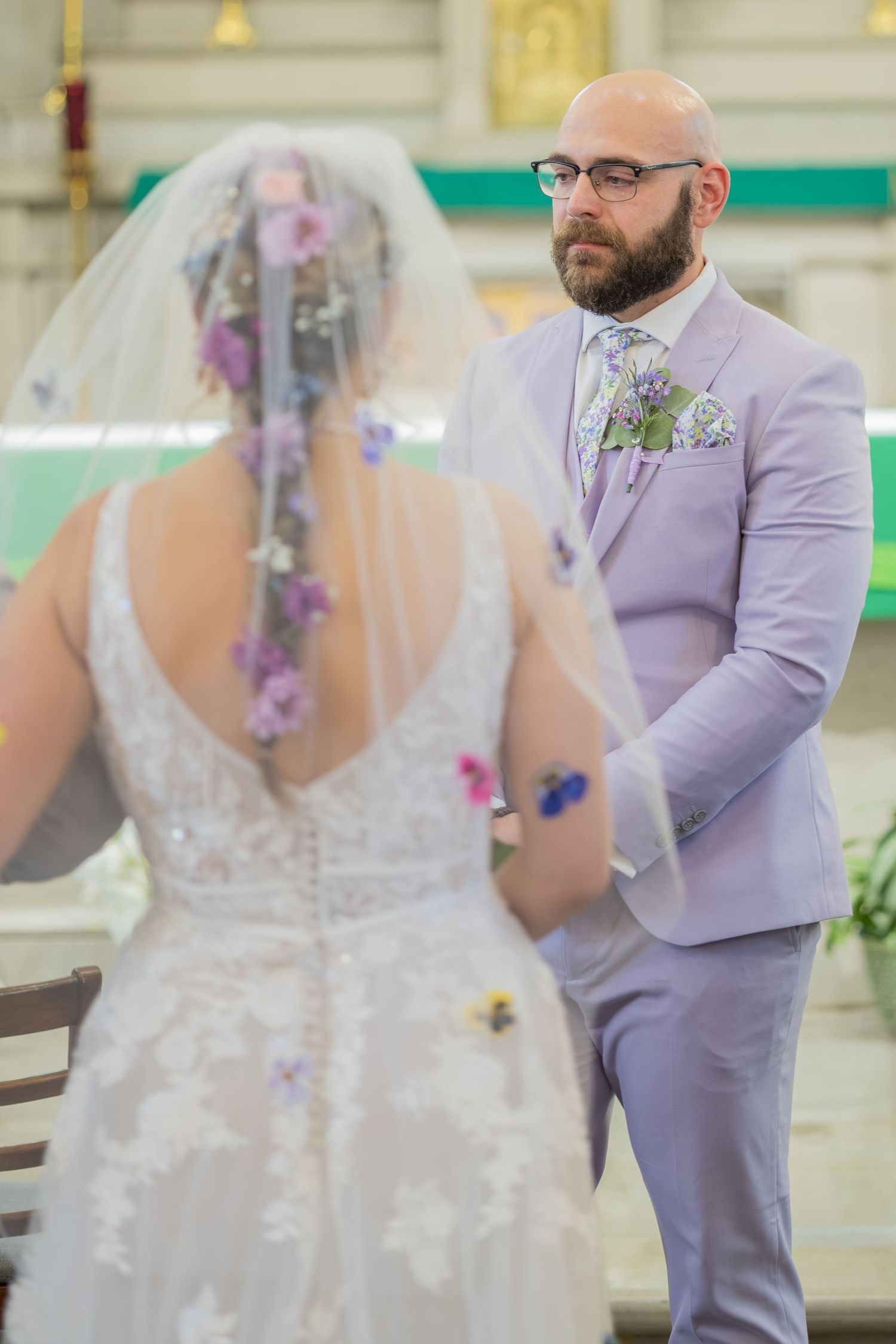 Bride and groom sharing joyful moments on their wedding day with timeless portraits, candid emotions, and elegant details.