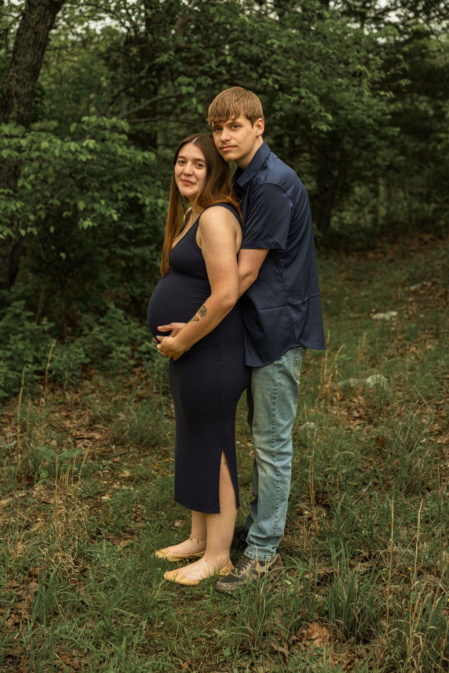 Expecting mother during a maternity session with natural posing, soft light, and timeless portraits celebrating motherhood.