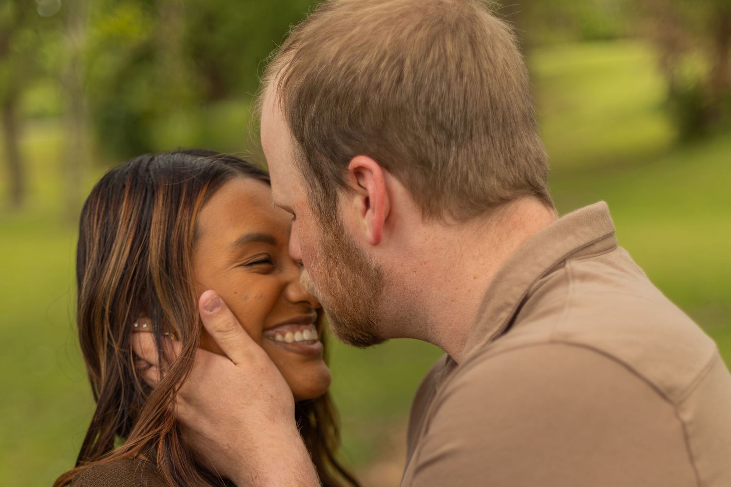 Romantic couples session with candid moments, natural poses, and golden-hour light in a scenic outdoor location.