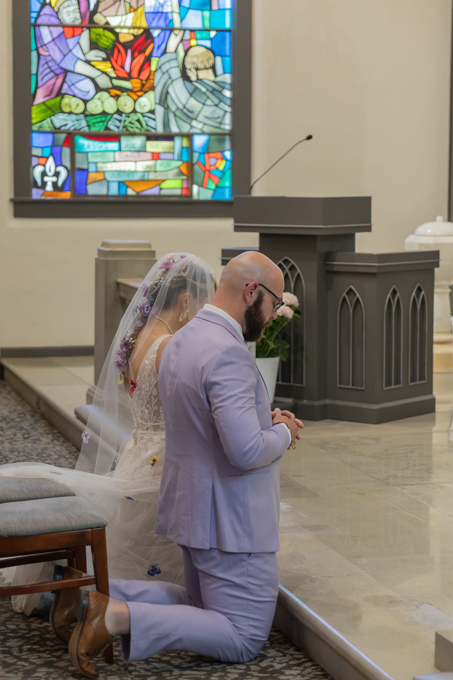 Bride and groom sharing joyful moments on their wedding day with timeless portraits, candid emotions, and elegant details.