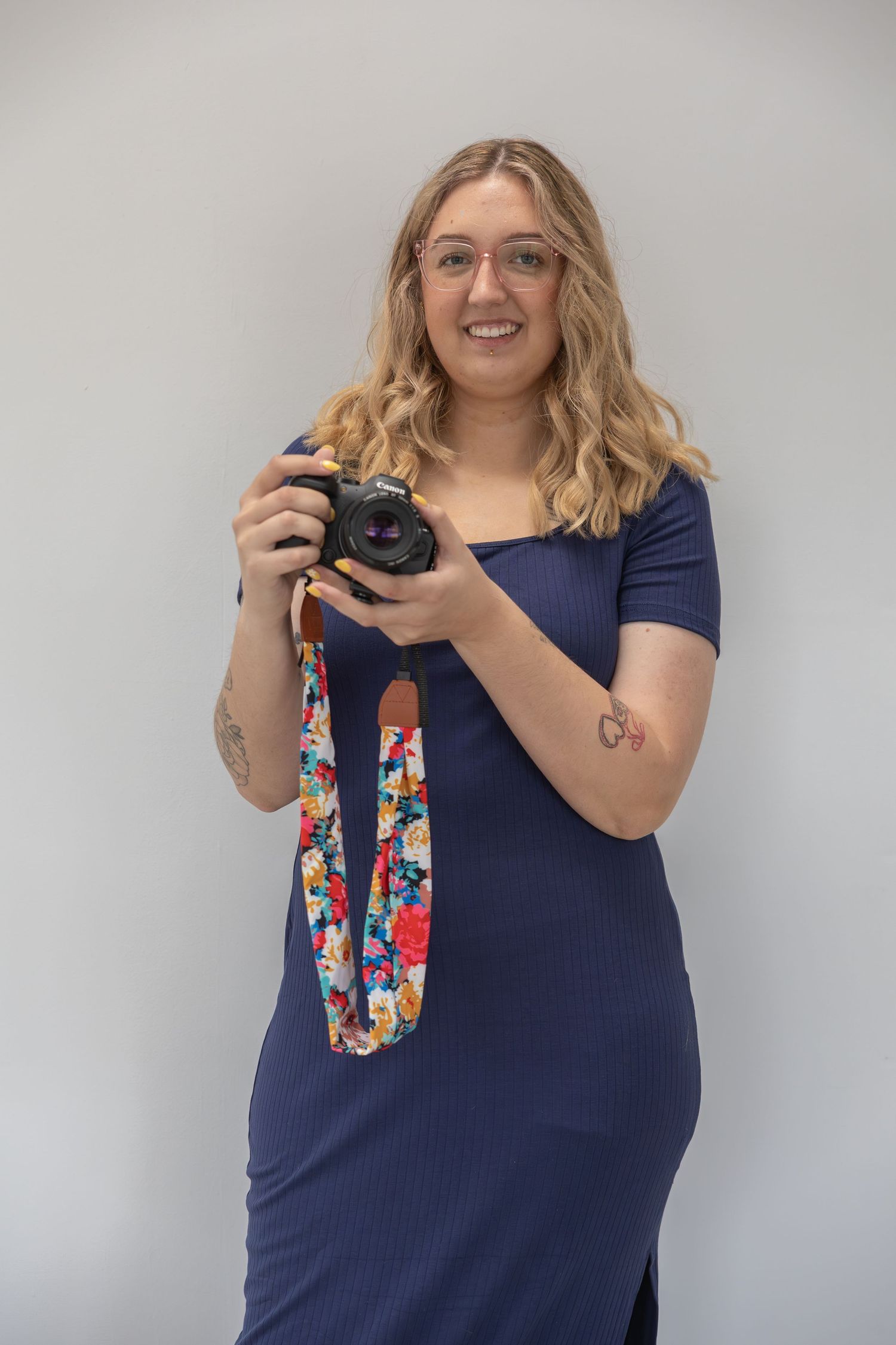 Professional branding session featuring a small business owner with lifestyle portraits, headshots, and authentic brand imagery.
