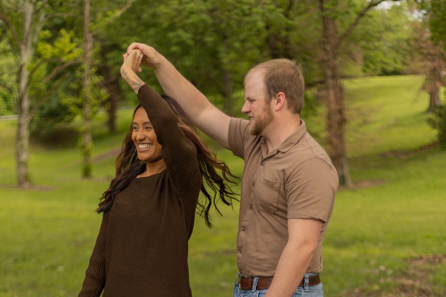 Romantic couples session with candid moments, natural poses, and golden-hour light in a scenic outdoor location.