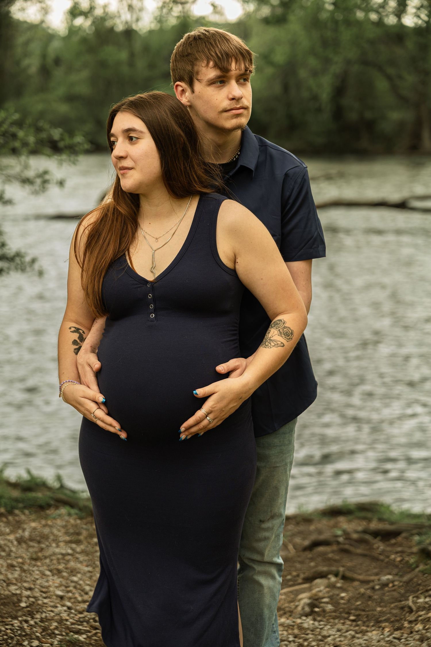 Expecting mother during a maternity session with natural posing, soft light, and timeless portraits celebrating motherhood.