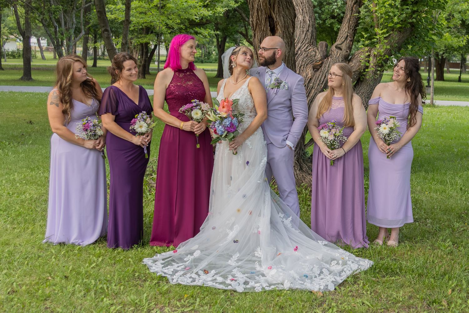 Bride and groom sharing joyful moments on their wedding day with timeless portraits, candid emotions, and elegant details.