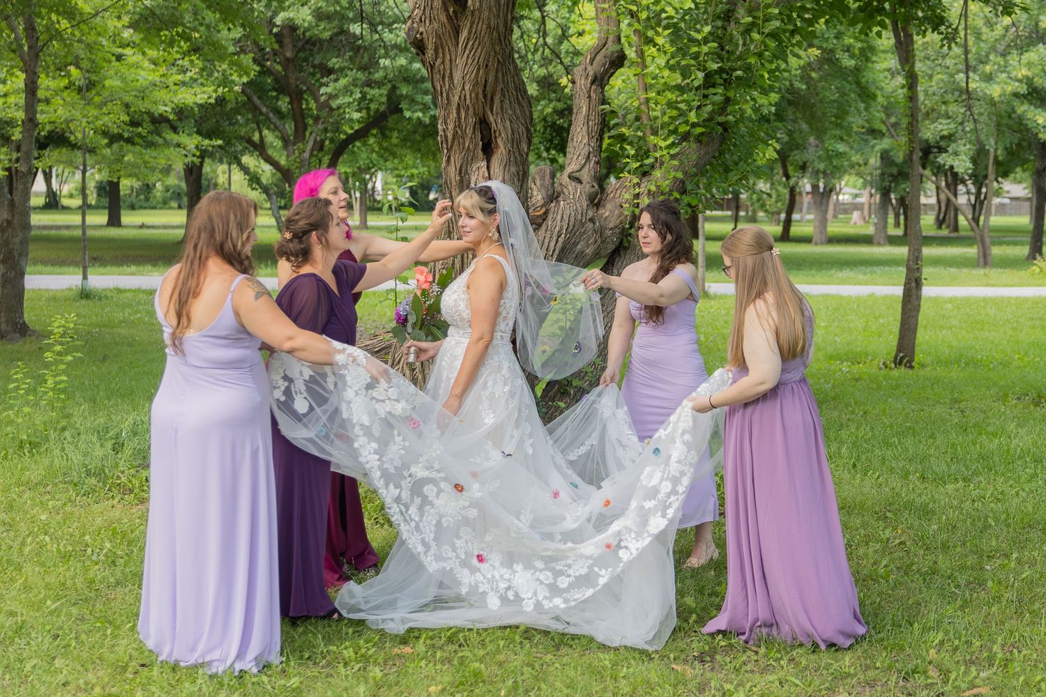 Bride and groom sharing joyful moments on their wedding day with timeless portraits, candid emotions, and elegant details.