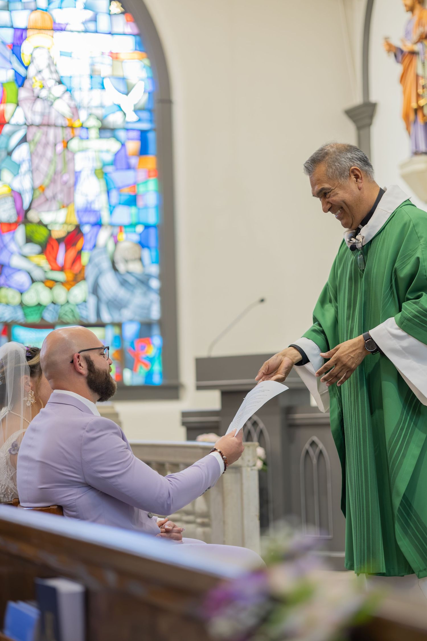 Bride and groom sharing joyful moments on their wedding day with timeless portraits, candid emotions, and elegant details.