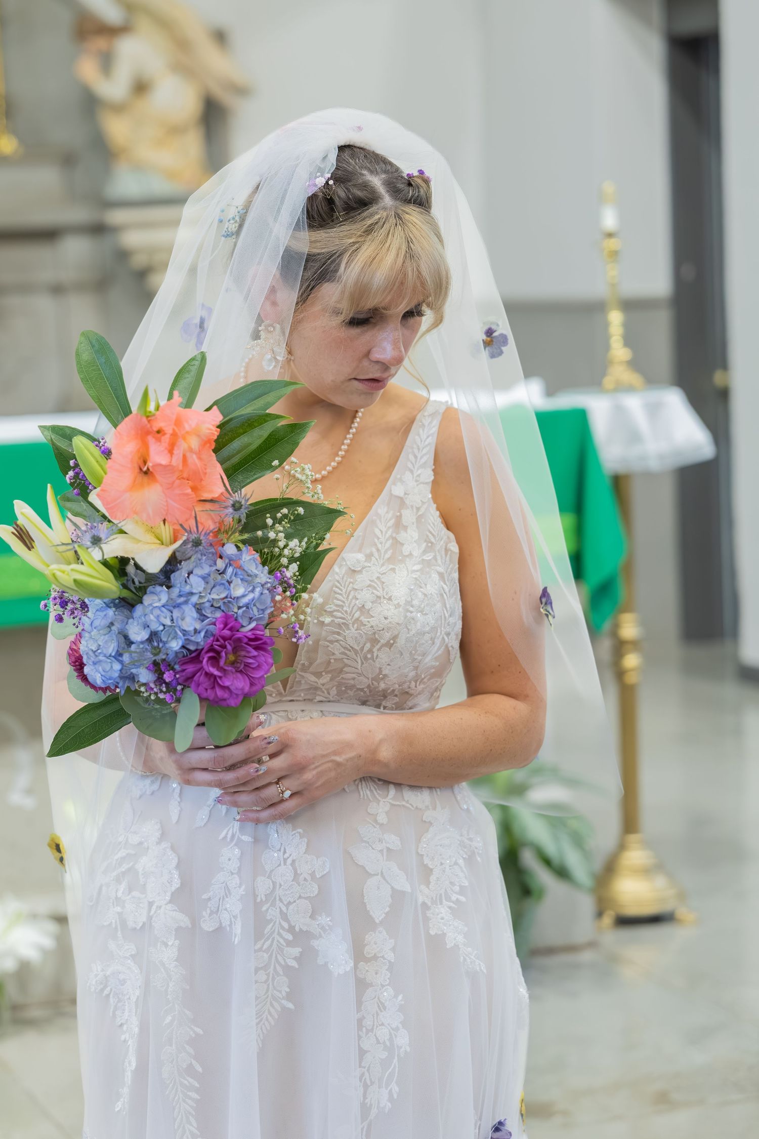 Bride and groom sharing joyful moments on their wedding day with timeless portraits, candid emotions, and elegant details.
