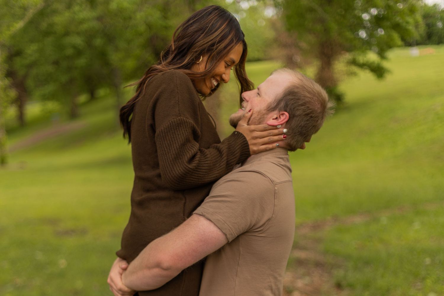 Romantic couples session with candid moments, natural poses, and golden-hour light in a scenic outdoor location.