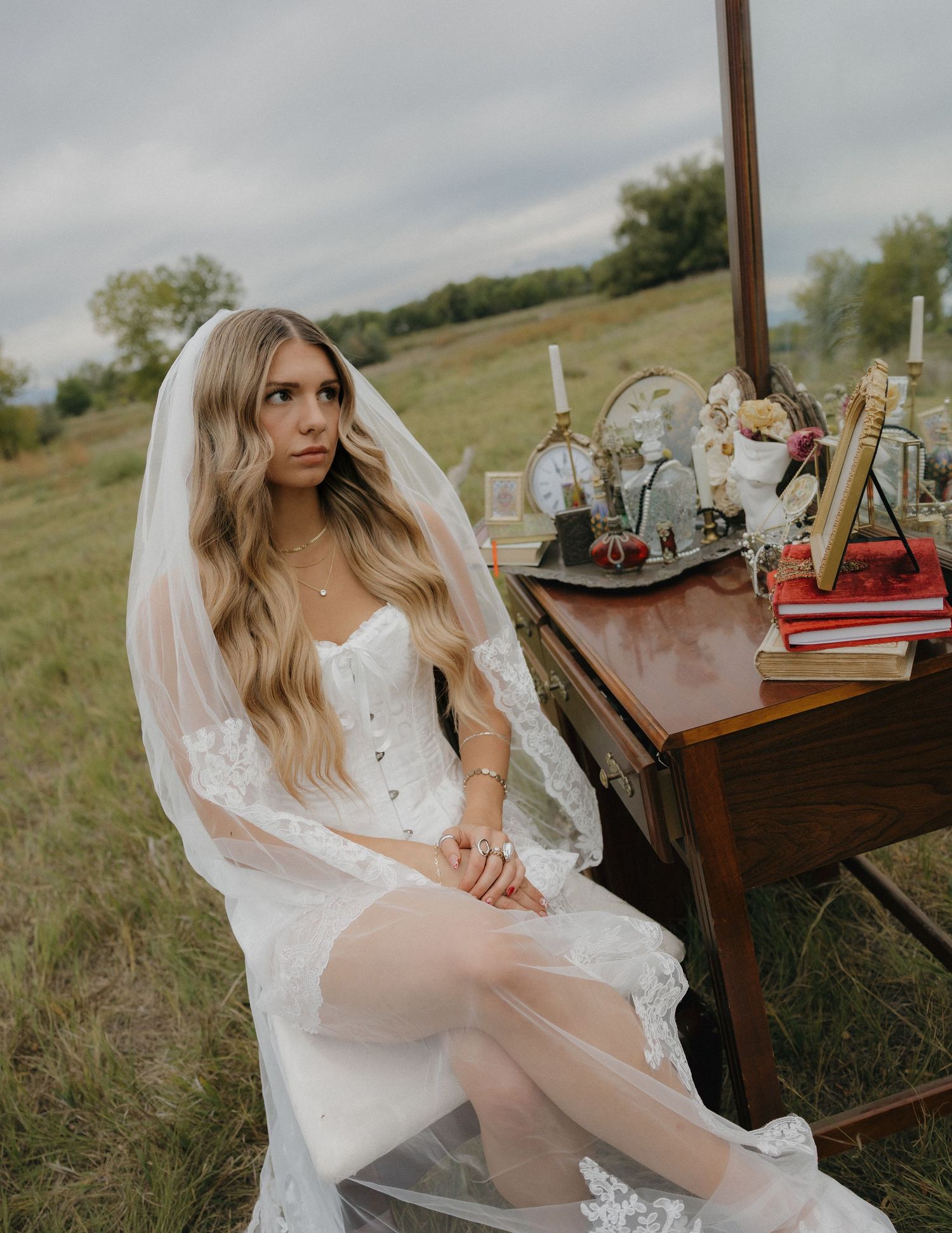 Intimate wedding morning details featuring a softly illuminated vanity