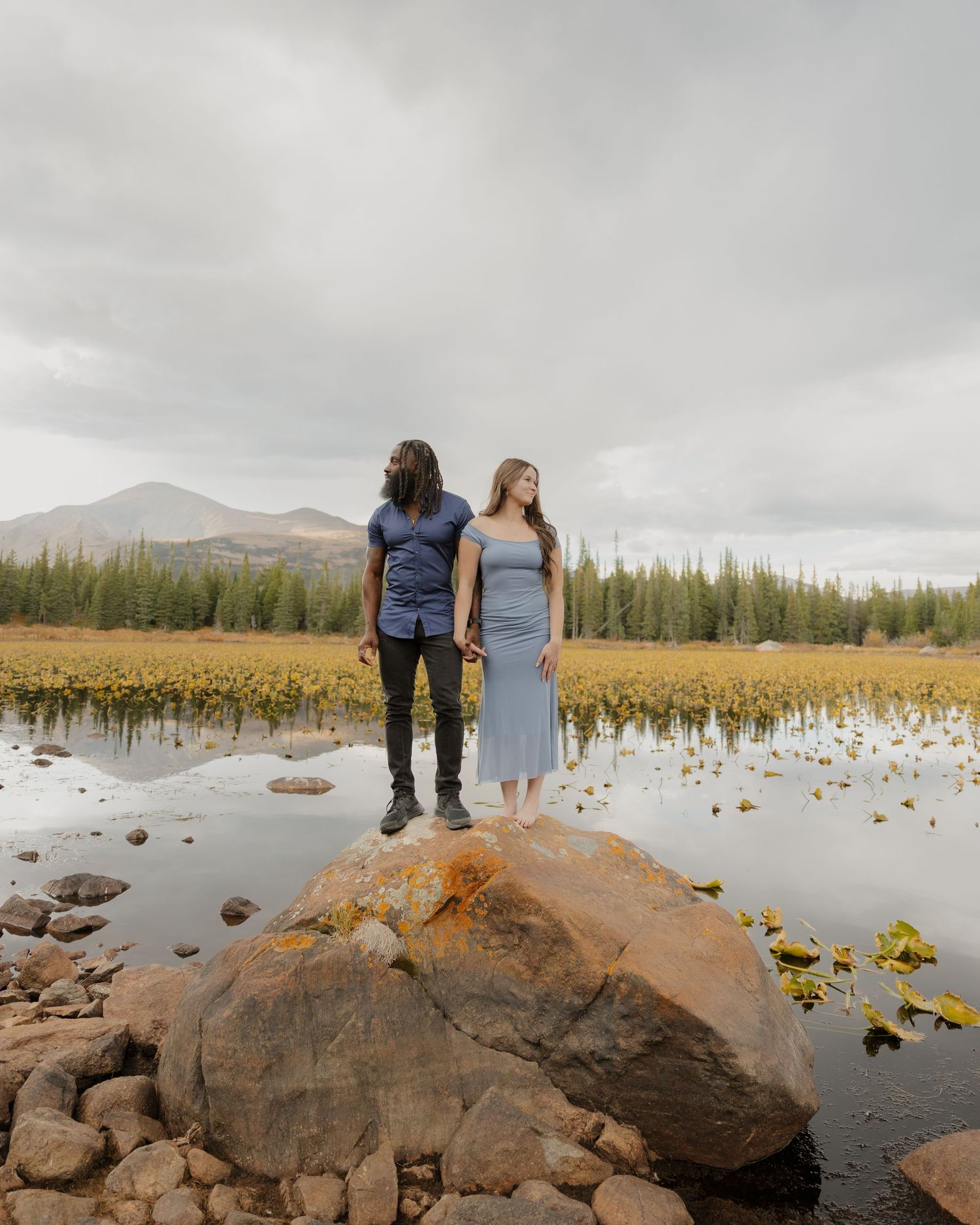 Romantic lakeside couples portrait in Roosevelt National Forest Colorado