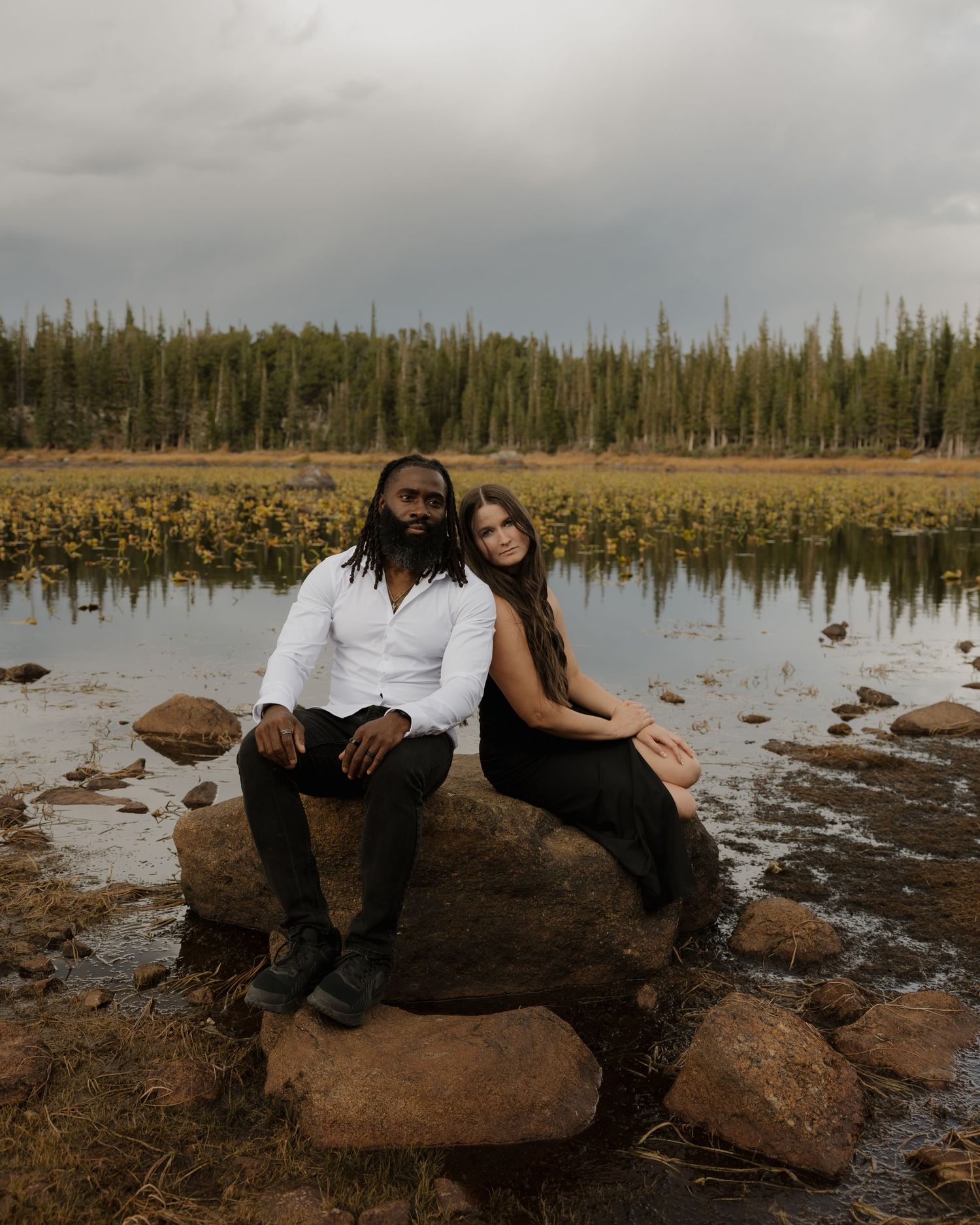 Cinematic engagement portrait with soft natural light and timeless styling