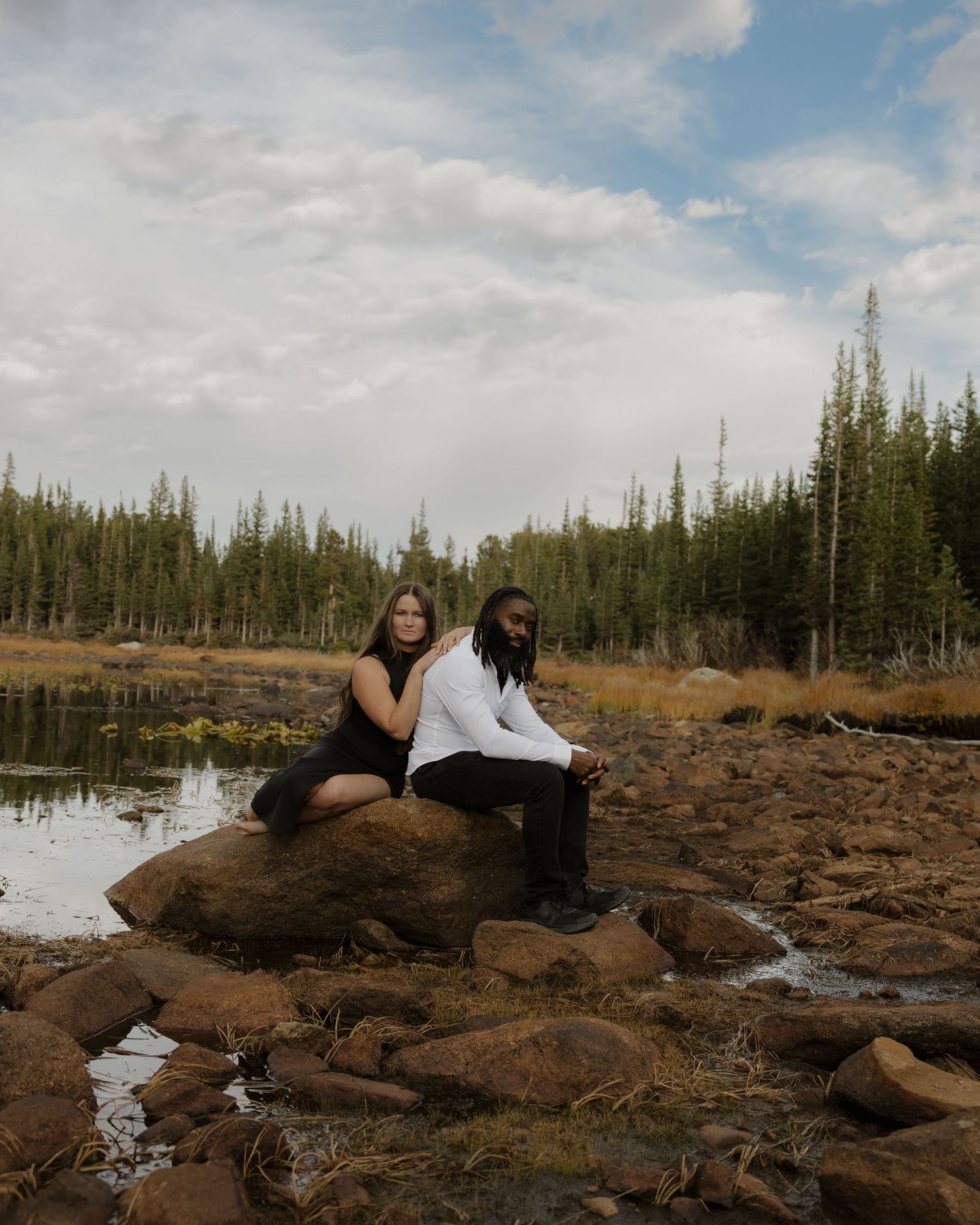 Editorial couples photography surrounded by Colorado forest and mountain scenery