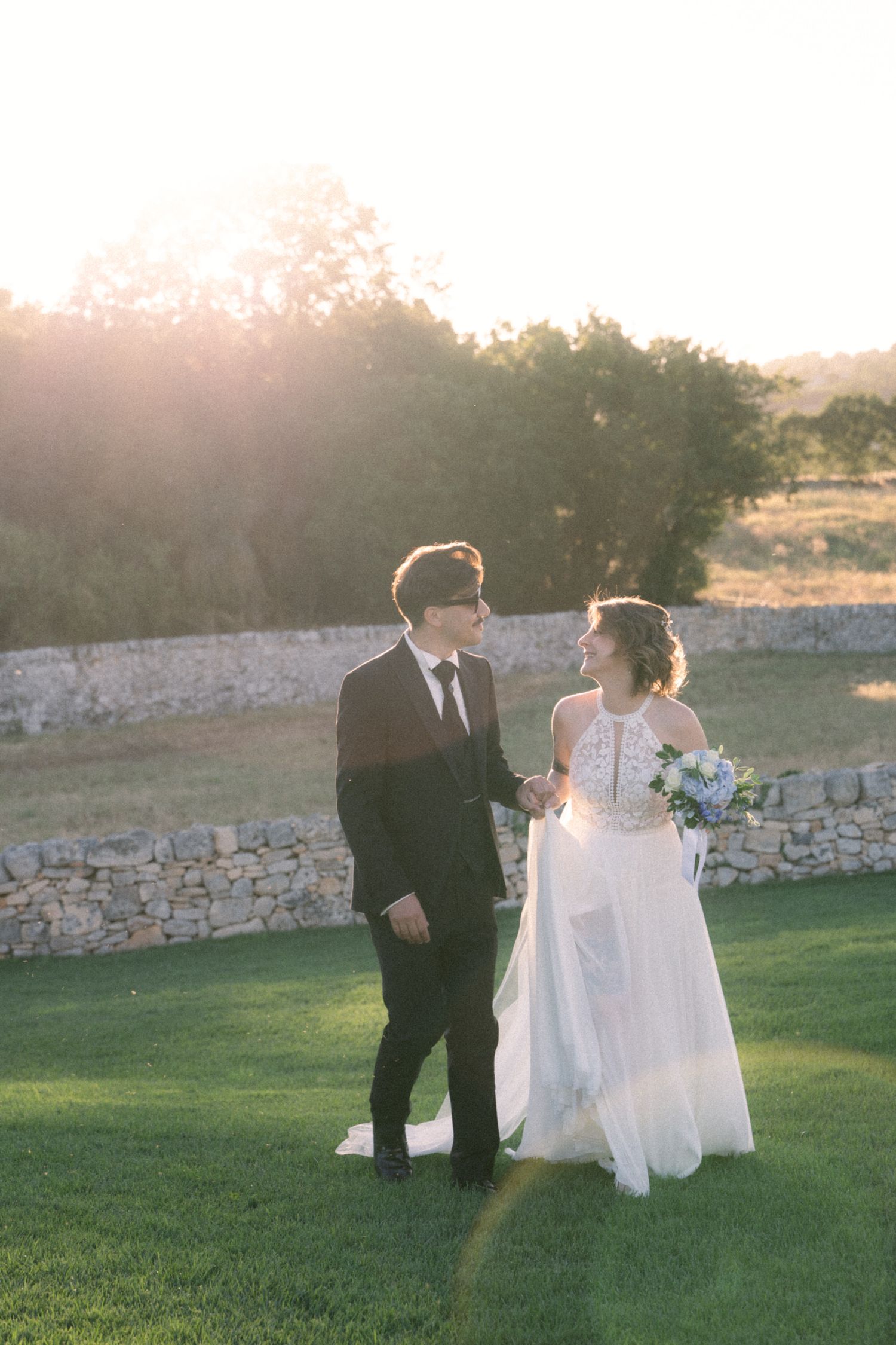 Destination wedding photography in Alberobello, Puglia, captured in digital with a clean and elegant visual style.