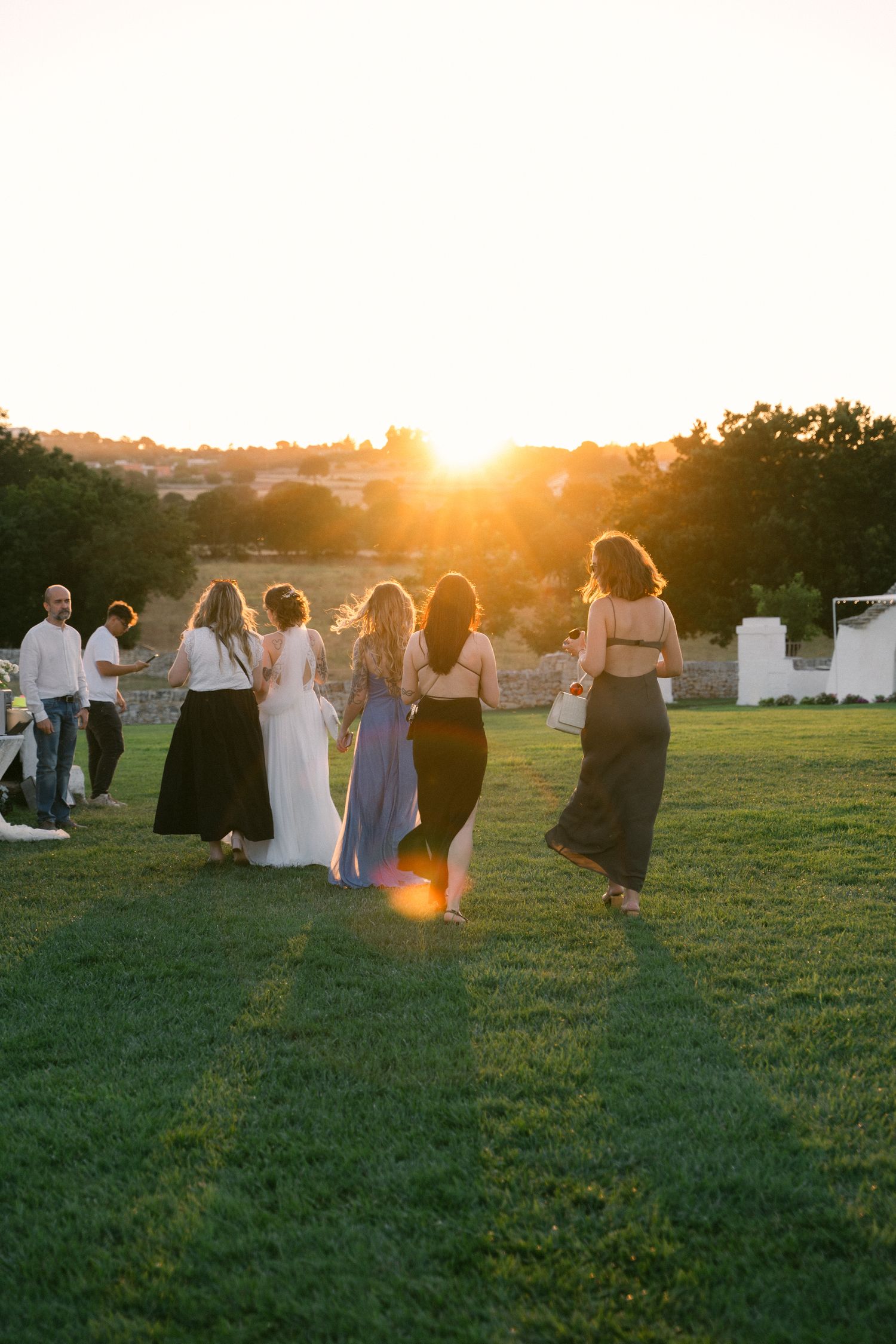 Destination wedding photography in Alberobello, Puglia, captured in digital with a clean and elegant visual style.