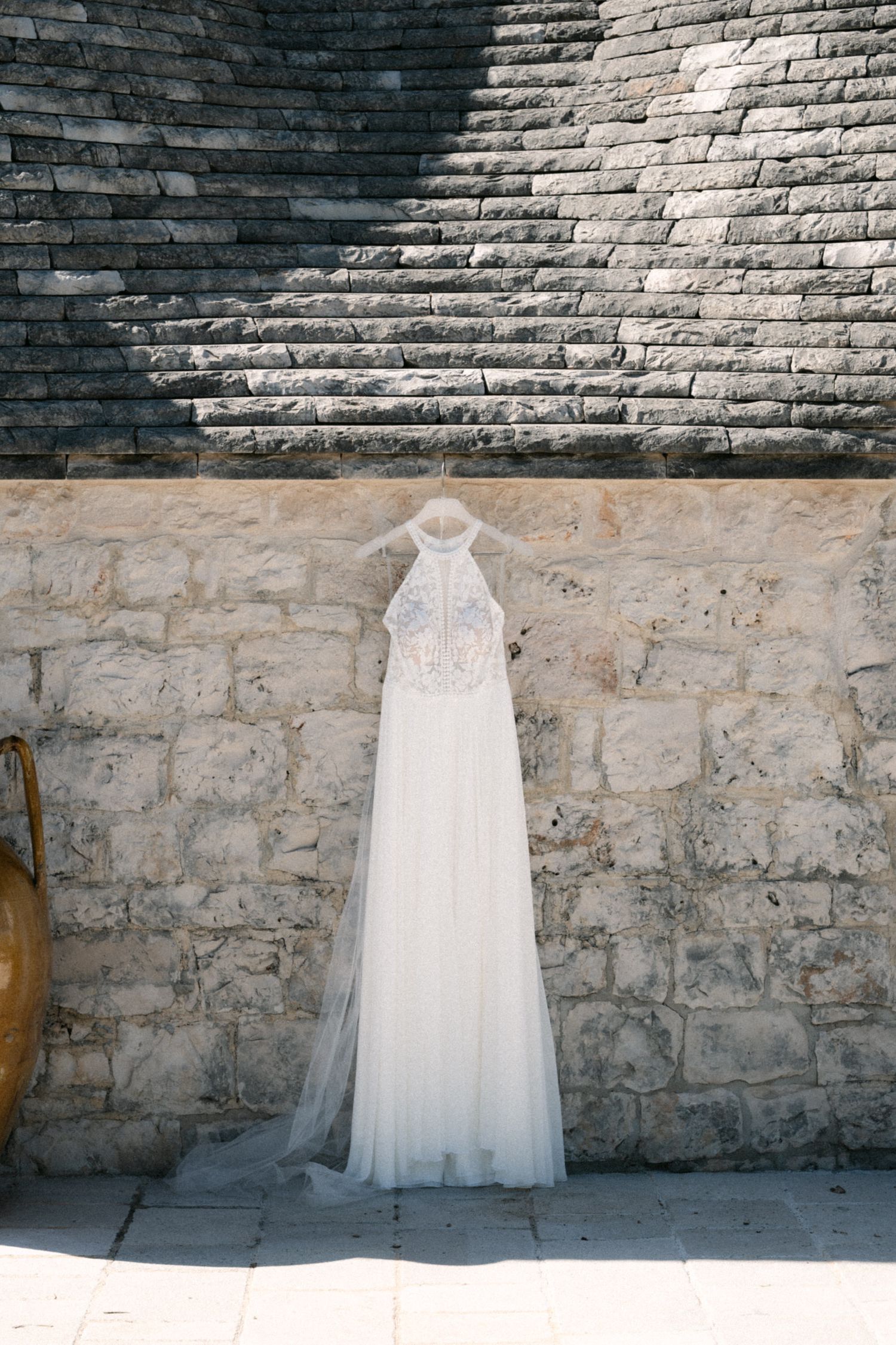 Destination wedding photography in Alberobello, Puglia, captured in digital with a clean and elegant visual style.