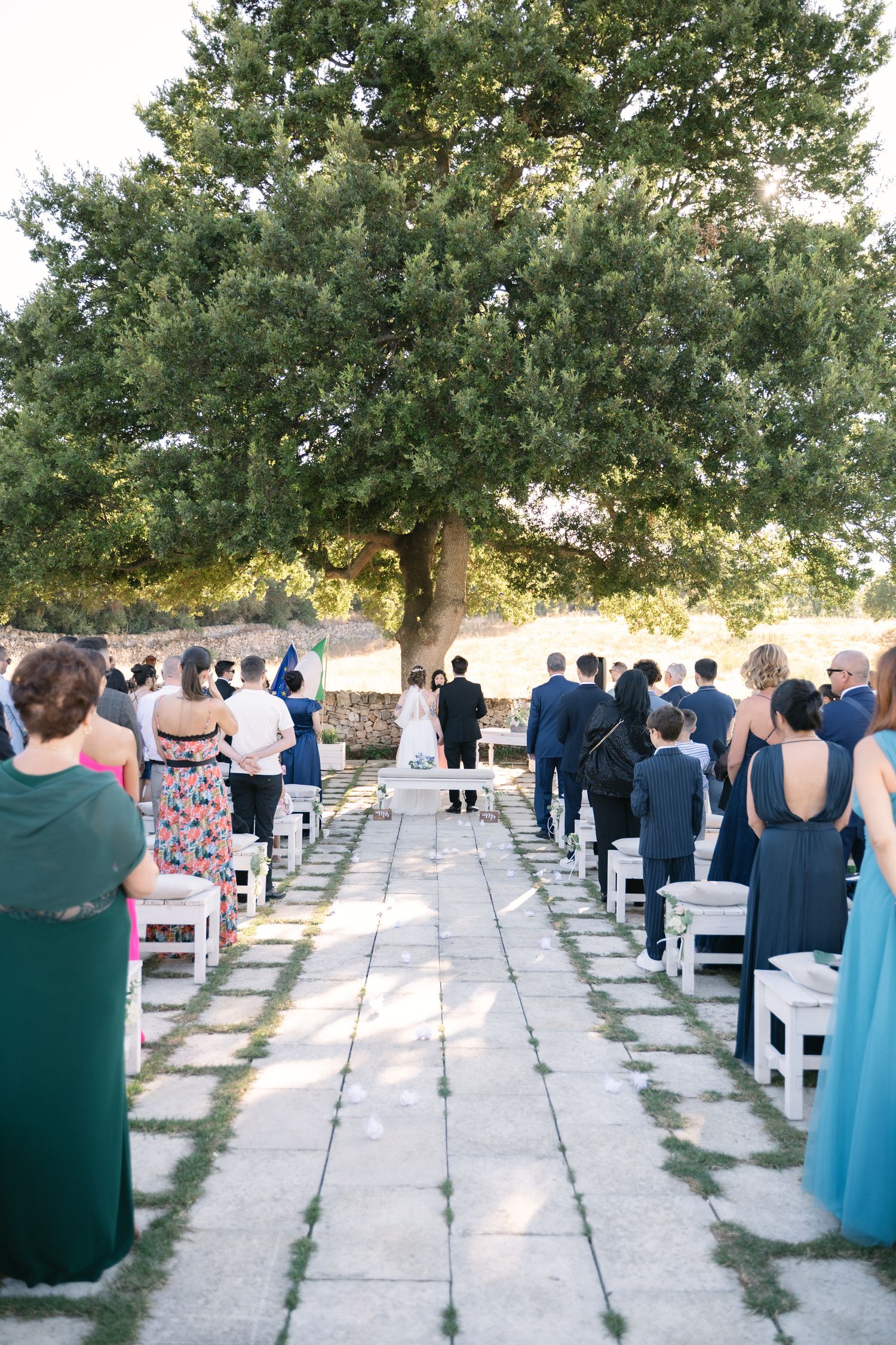 Destination wedding photography in Alberobello, Puglia, captured in digital with a clean and elegant visual style.