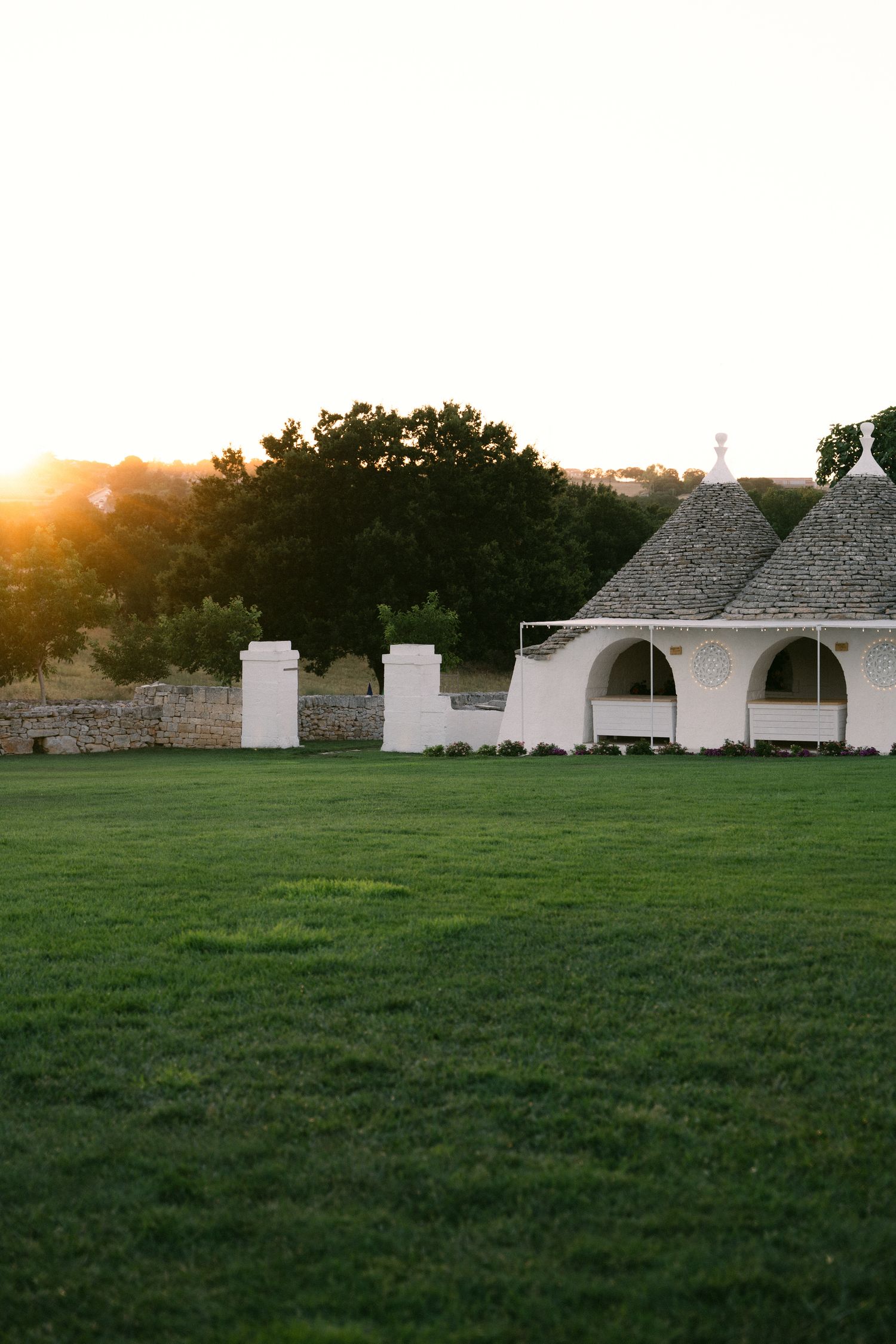 Destination wedding photography in Alberobello, Puglia, captured in digital with a clean and elegant visual style.