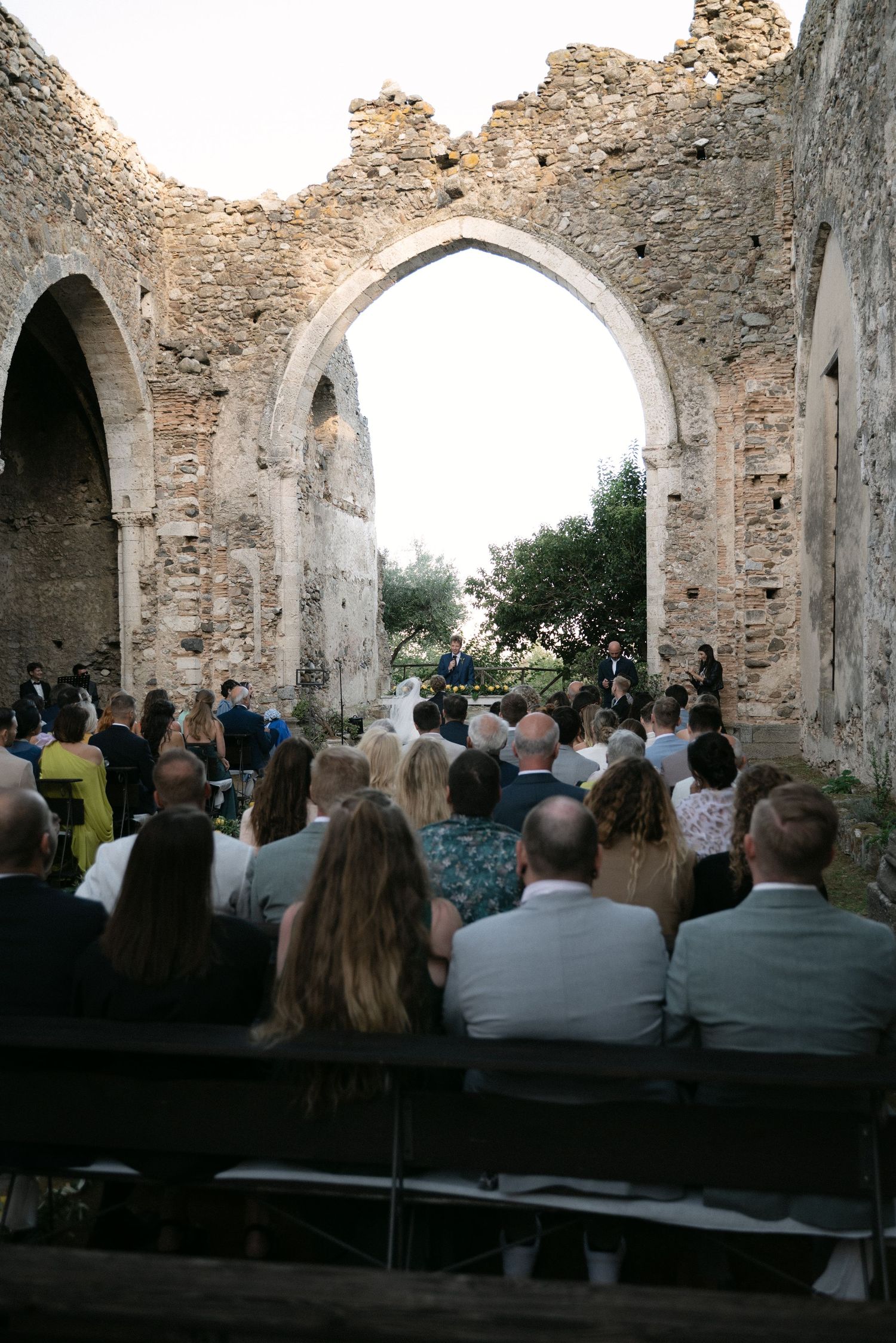 Italian–German wedding ceremony with international guests in Calabria