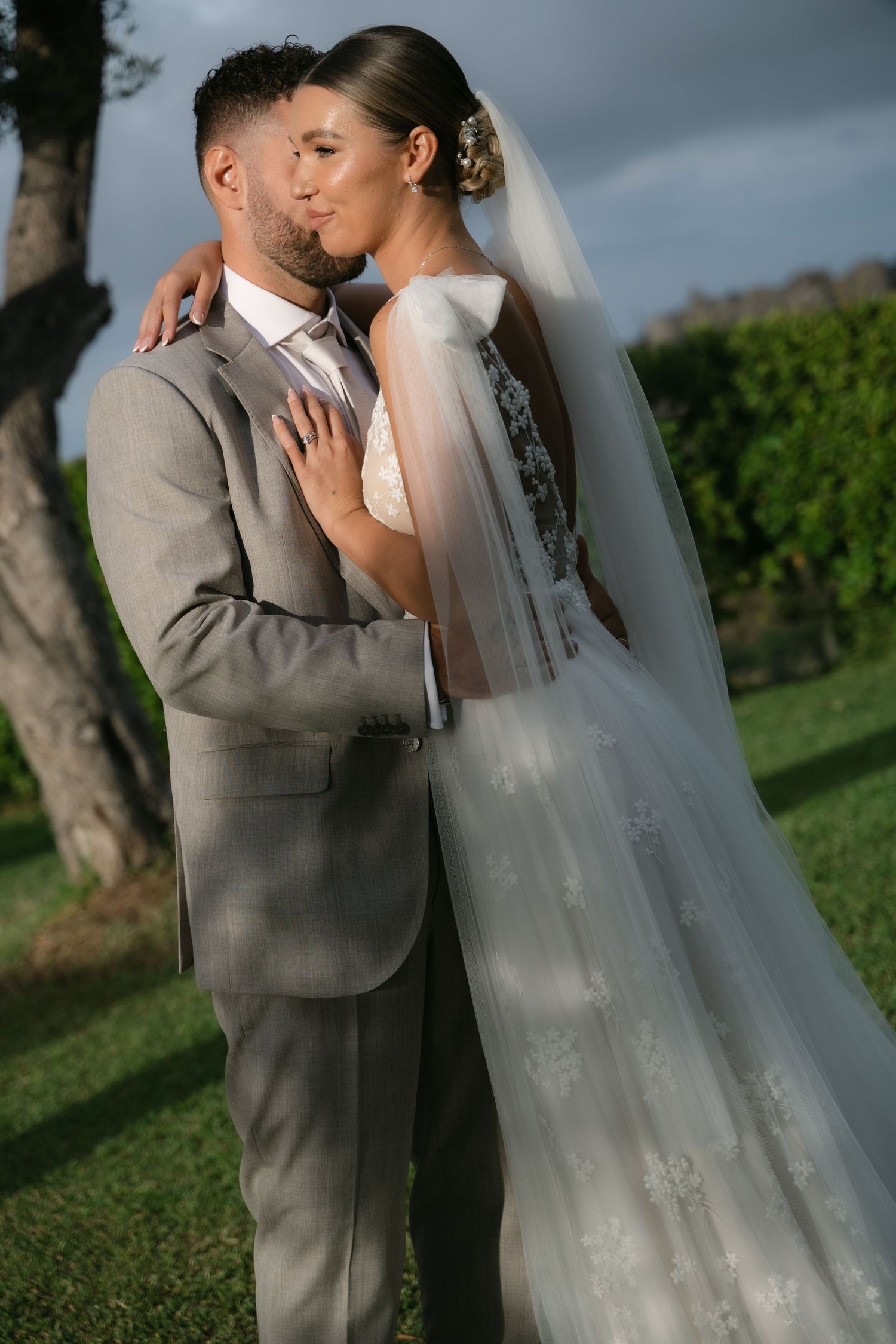 Intimate bride and groom portrait in warm evening light