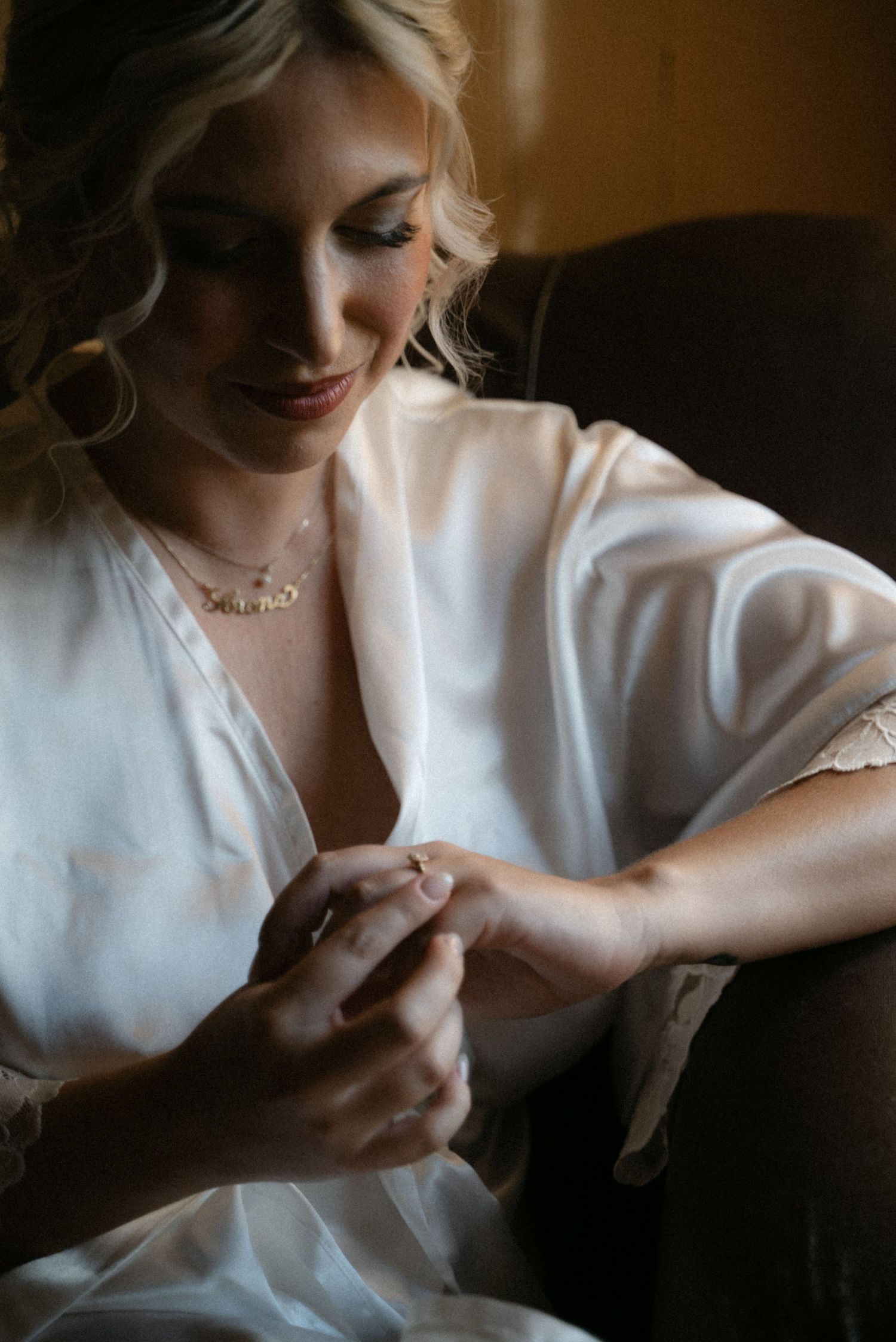 Bride getting ready in soft natural light