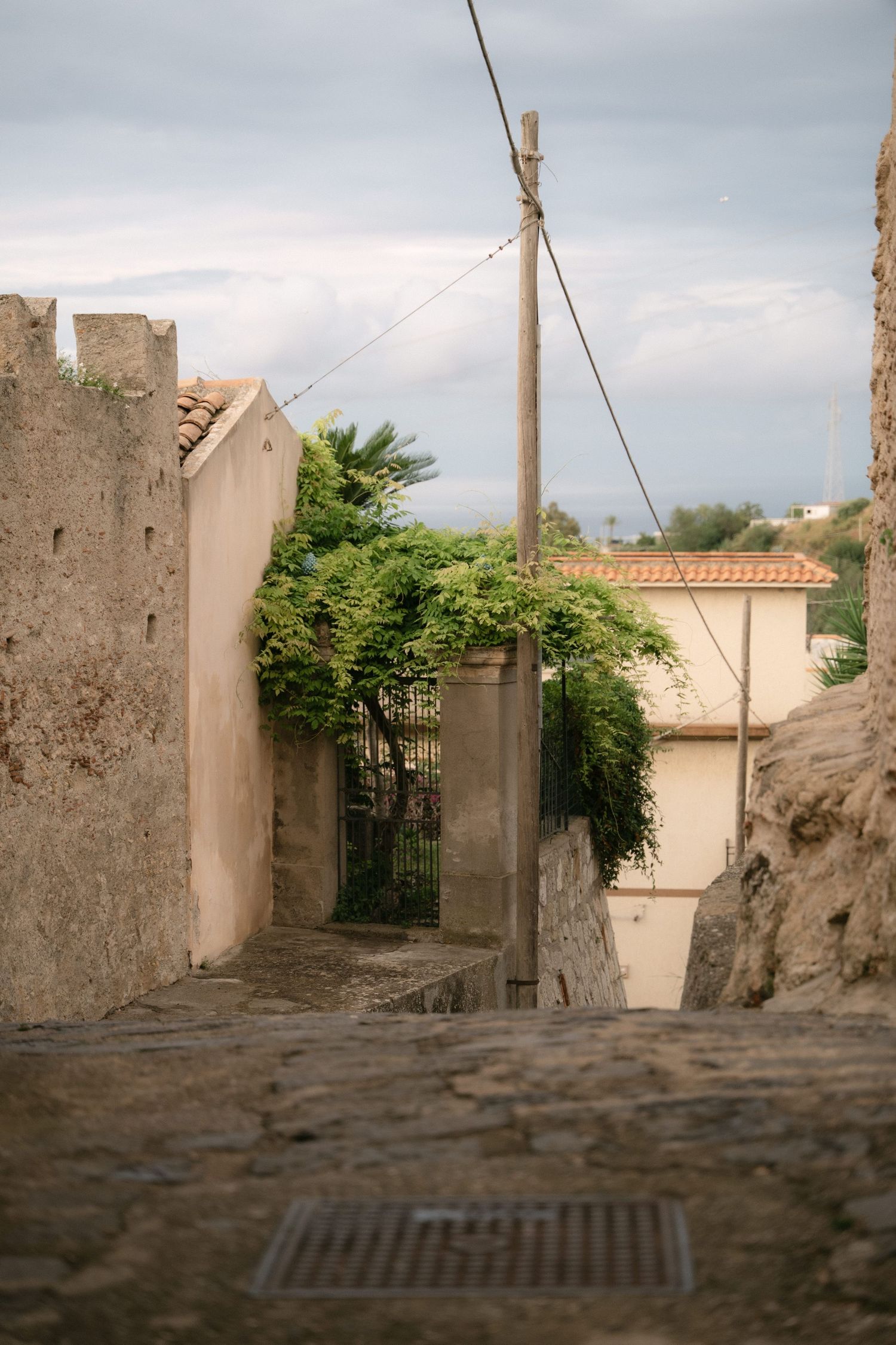 Quiet historic street photographed during a destination wedding in Sicily
