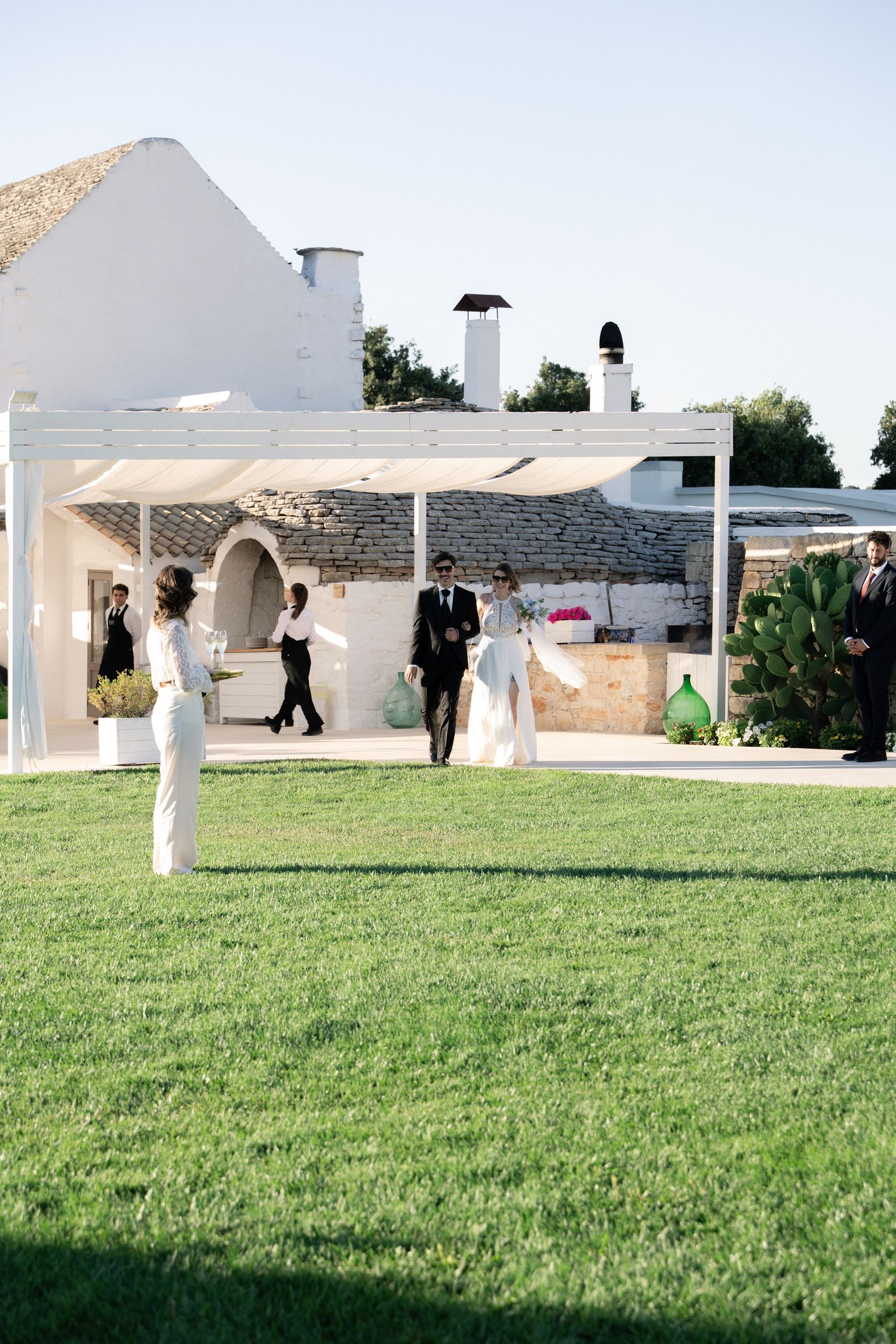 Destination wedding photography in Alberobello, Puglia, captured in digital with a clean and elegant visual style.