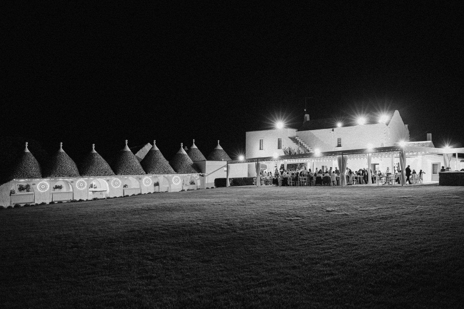 Destination wedding photography in Alberobello, Puglia, captured in digital with a clean and elegant visual style.