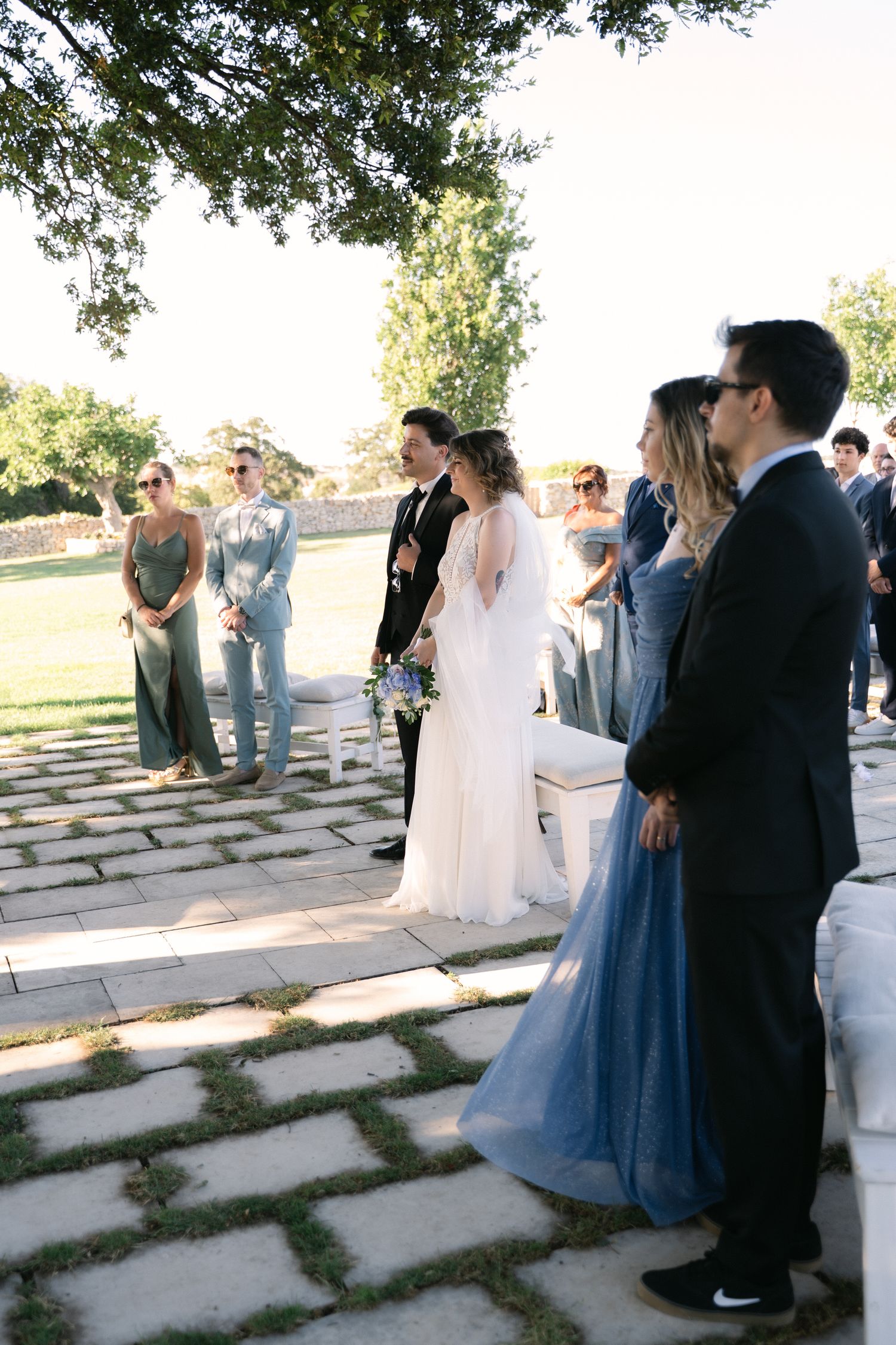 Destination wedding photography in Alberobello, Puglia, captured in digital with a clean and elegant visual style.