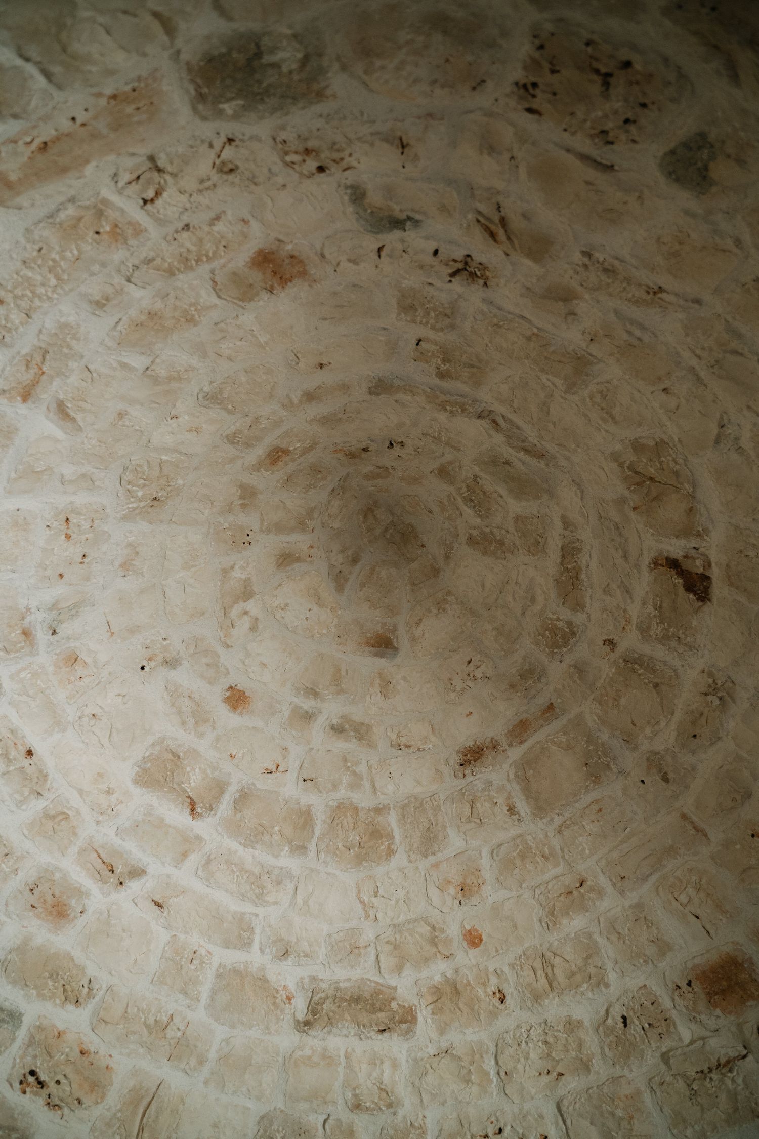 Destination wedding photography in Alberobello, Puglia, captured in digital with a clean and elegant visual style.