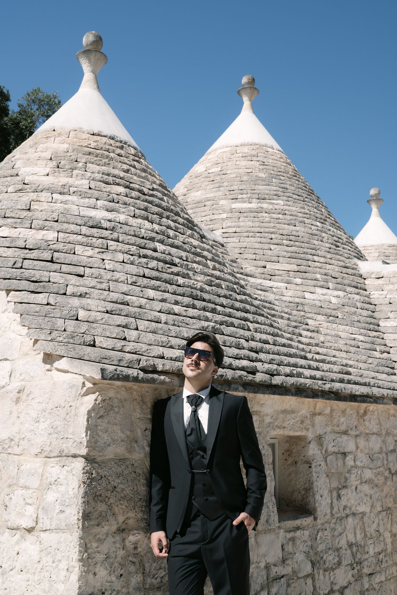 Destination wedding photography in Alberobello, Puglia, captured in digital with a clean and elegant visual style.