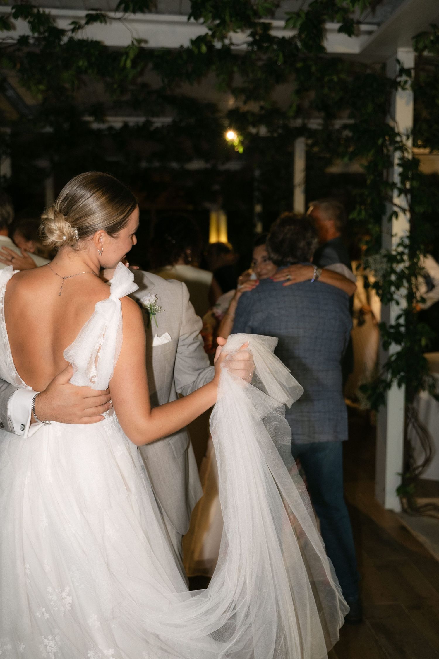 Newlyweds dancing together during the evening reception in Milazzo