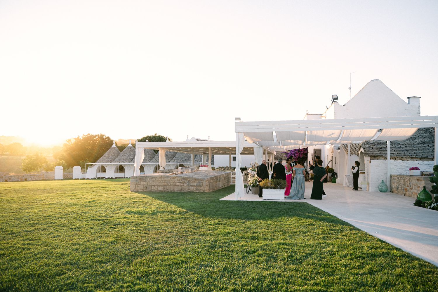 Destination wedding photography in Alberobello, Puglia, captured in digital with a clean and elegant visual style.