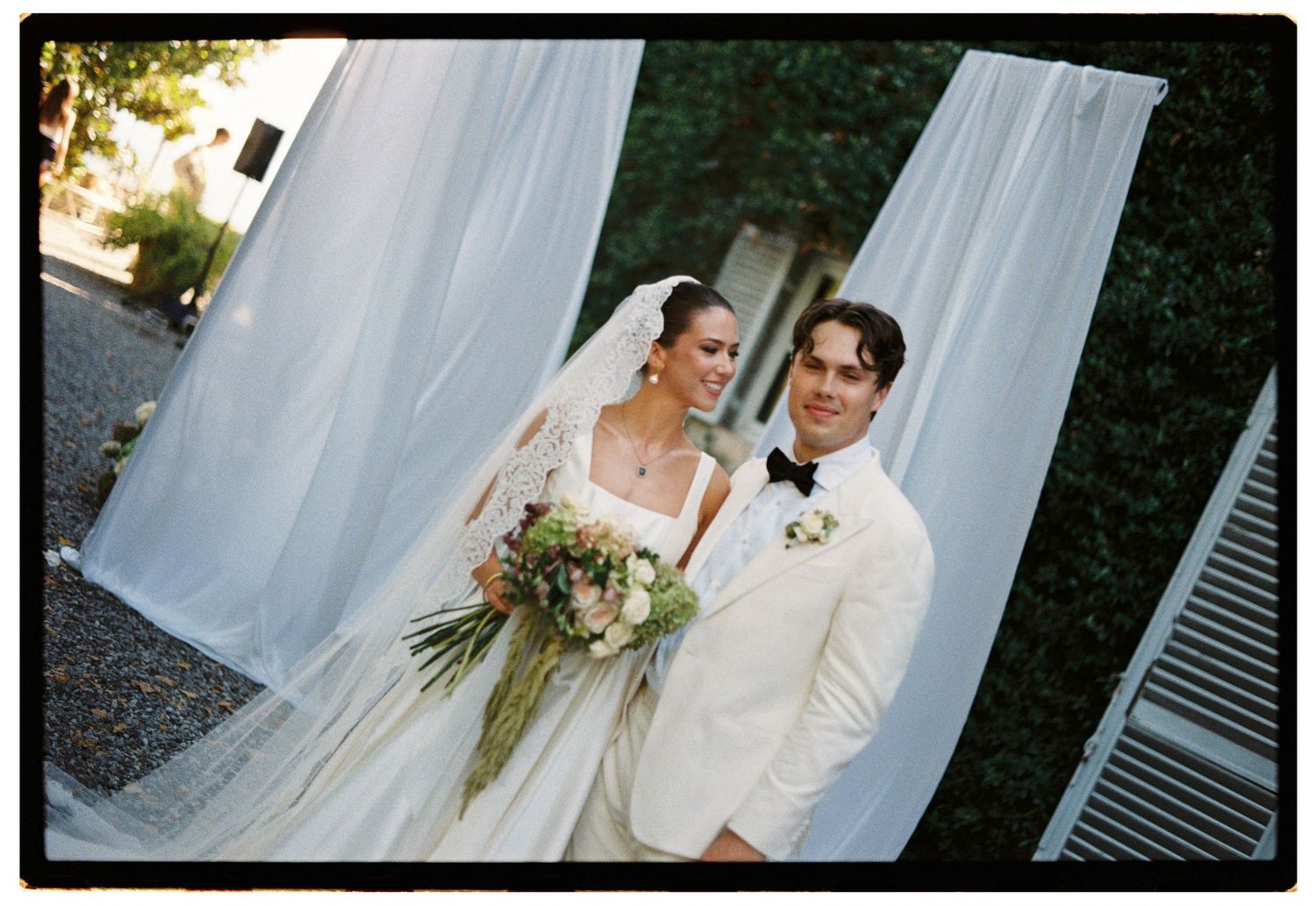 35mm film wedding photography from Lucca, Tuscany, with soft tones, texture, and a timeless wedding atmosphere.