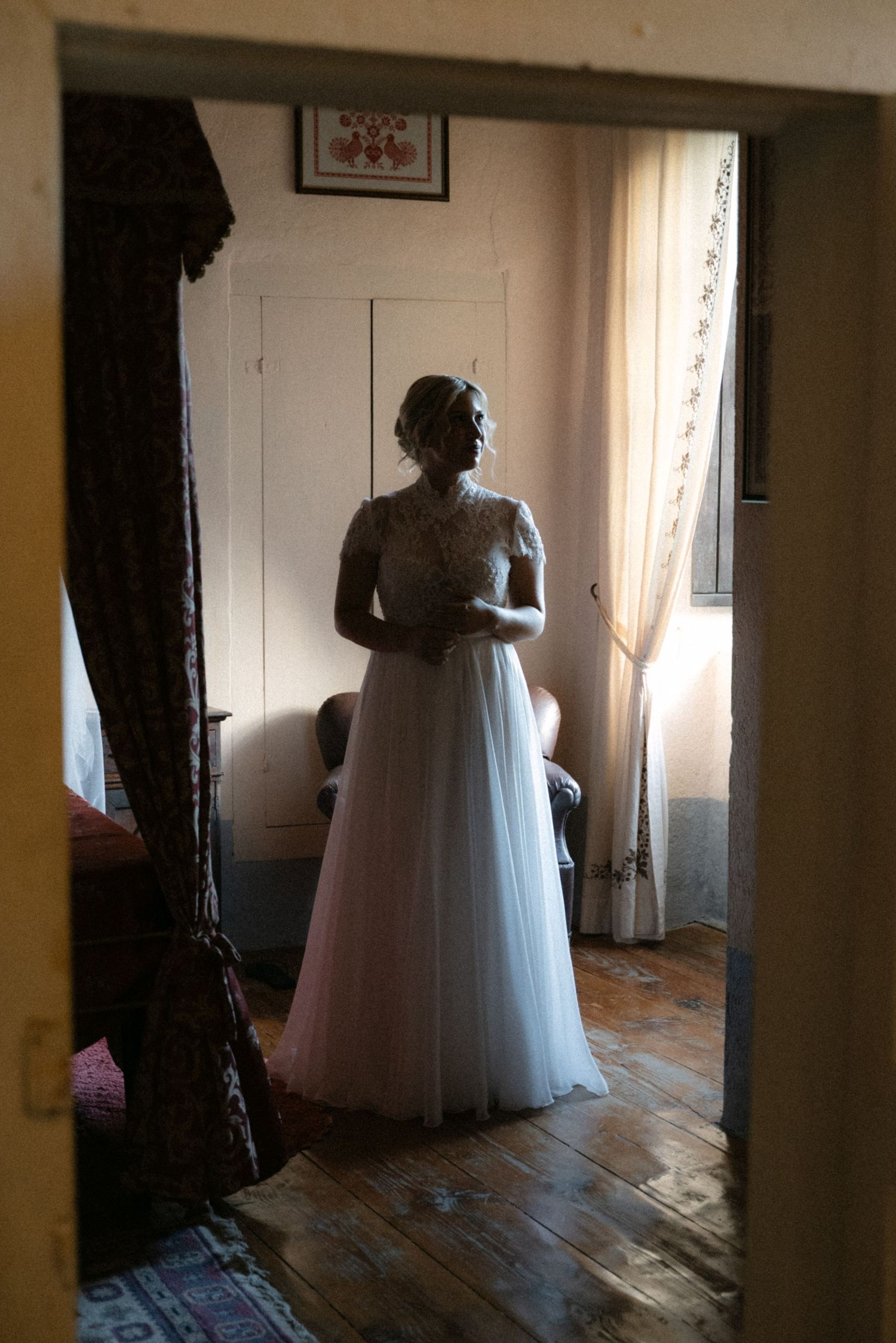 Bride wearing her wedding dress inside Borgo del Convento