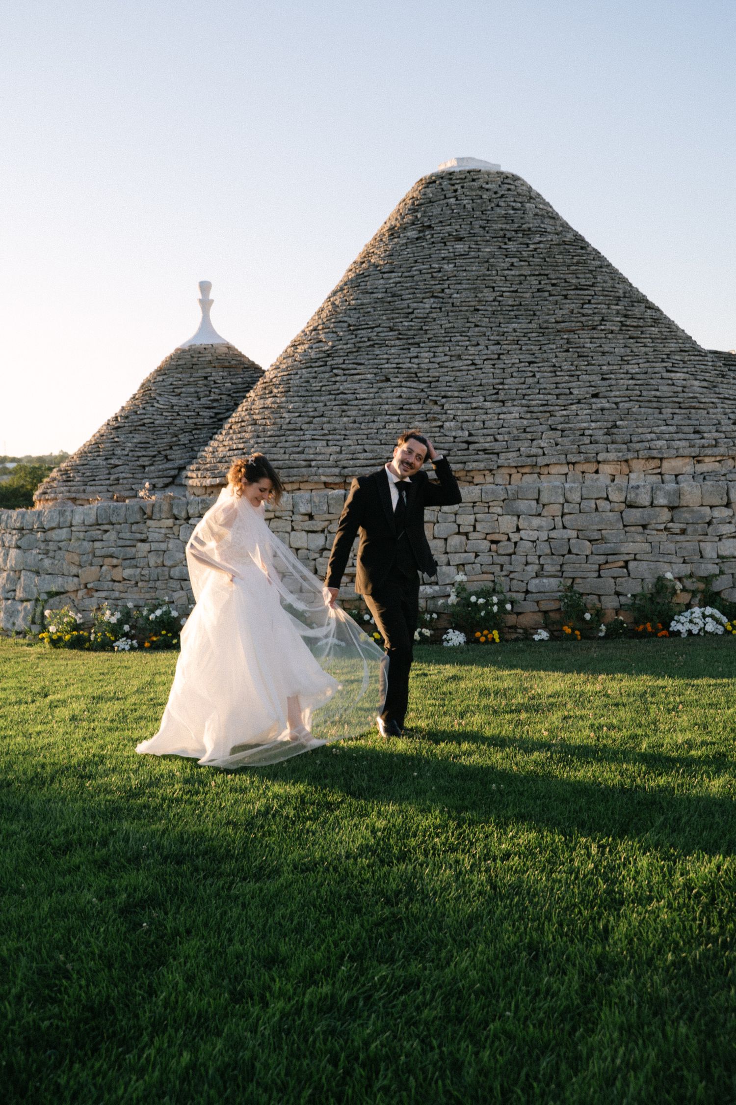 Destination wedding photography in Alberobello, Puglia, captured in digital with a clean and elegant visual style.