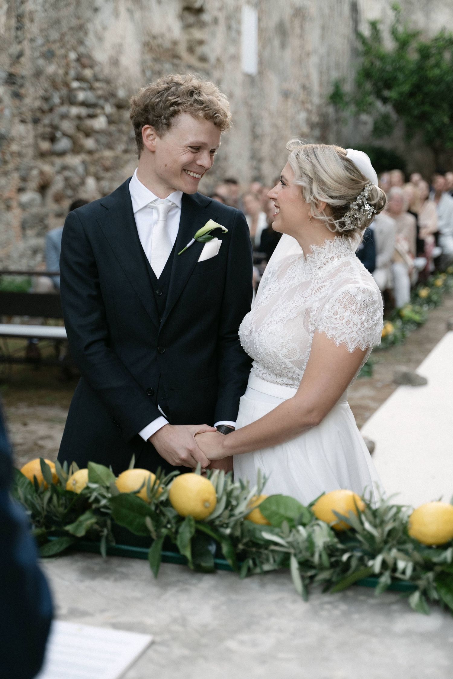 Serena and Paul smiling together during their ceremony in Calabria