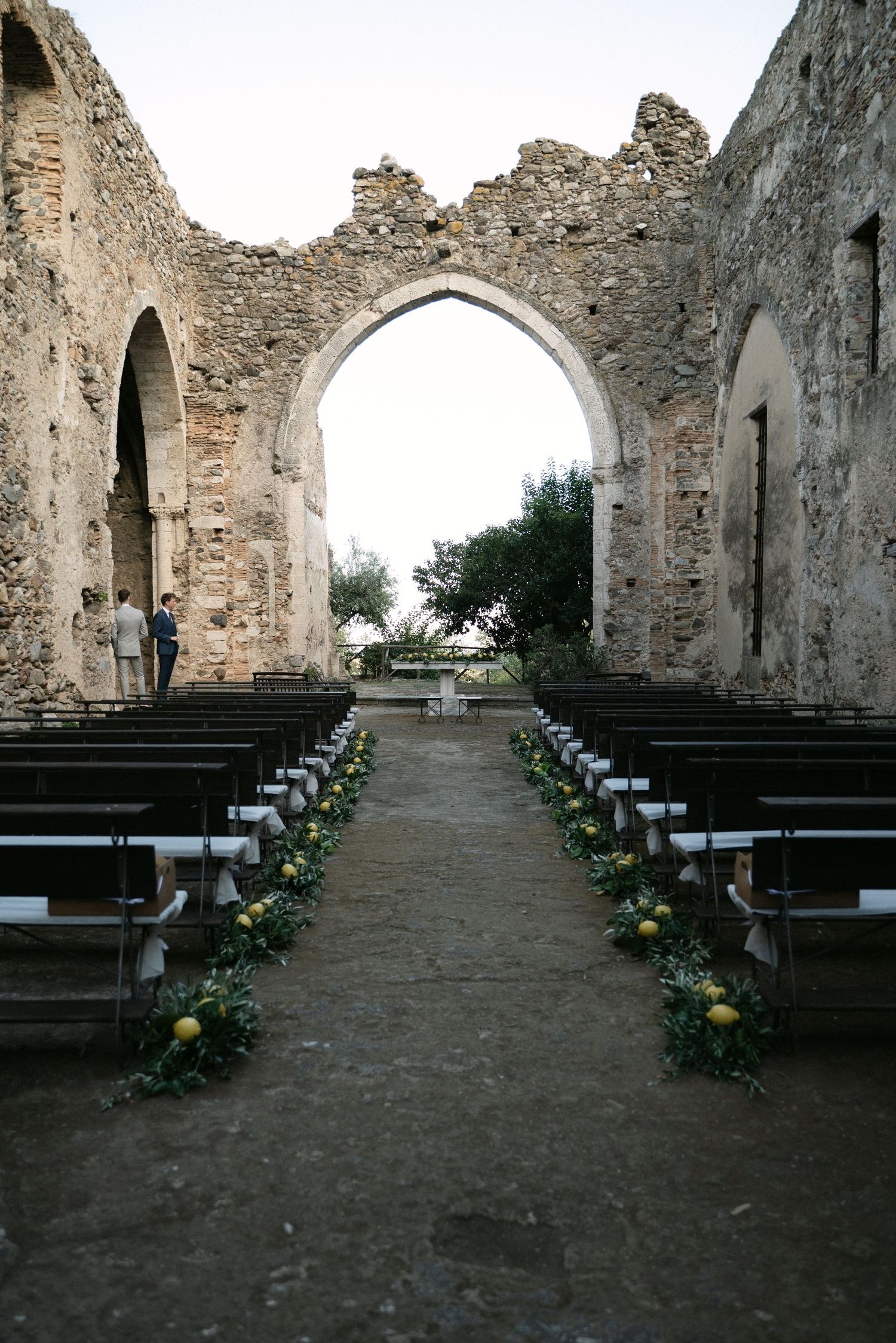 Outdoor wedding ceremony setting inside the historic monastery ruins