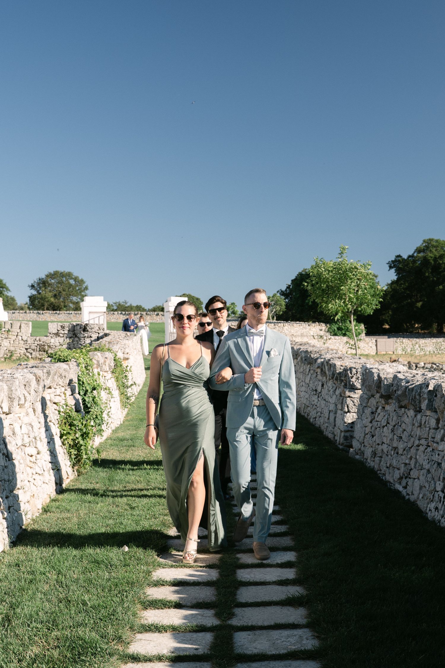 Destination wedding photography in Alberobello, Puglia, captured in digital with a clean and elegant visual style.