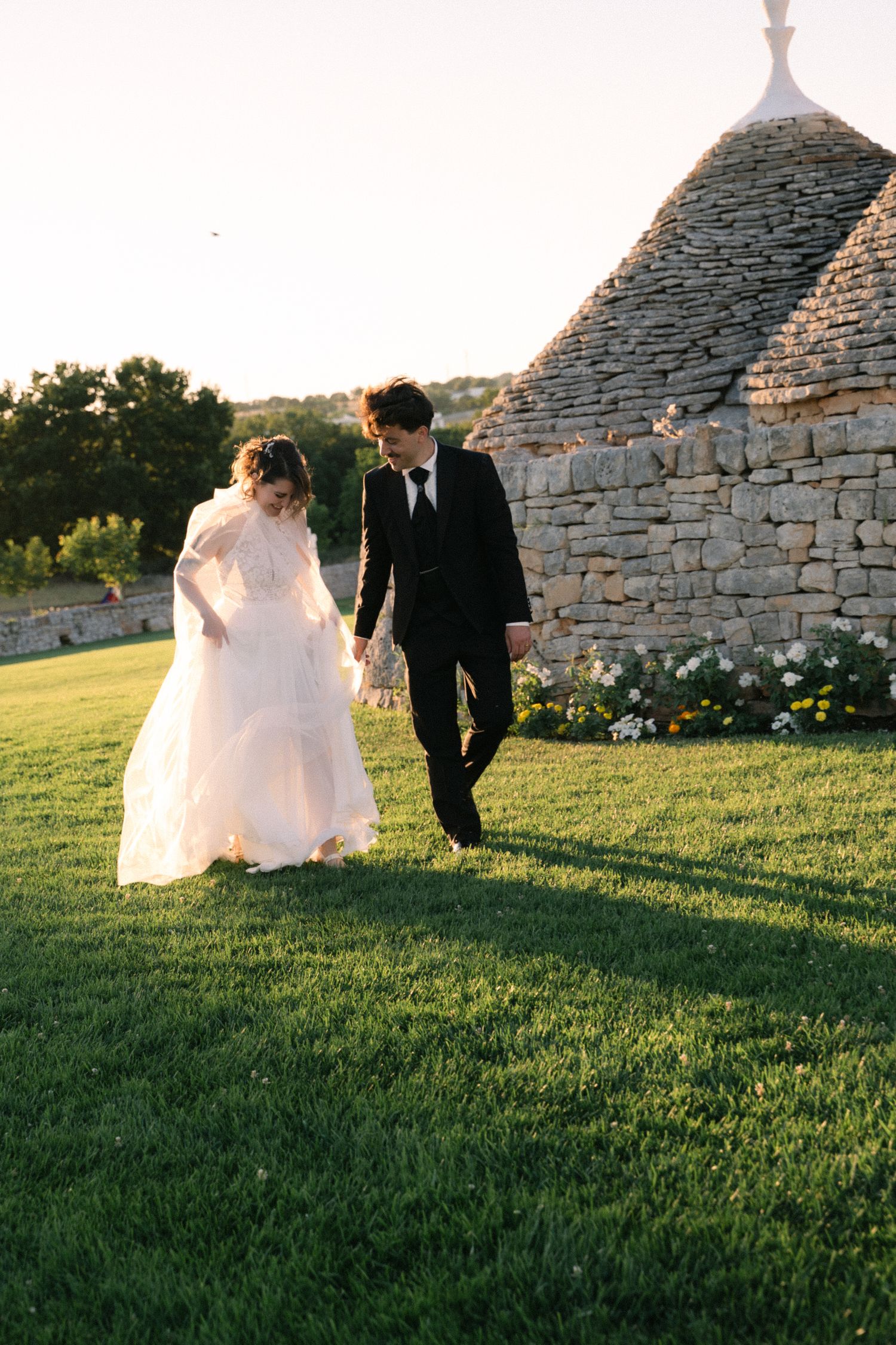 Destination wedding photography in Alberobello, Puglia, captured in digital with a clean and elegant visual style.