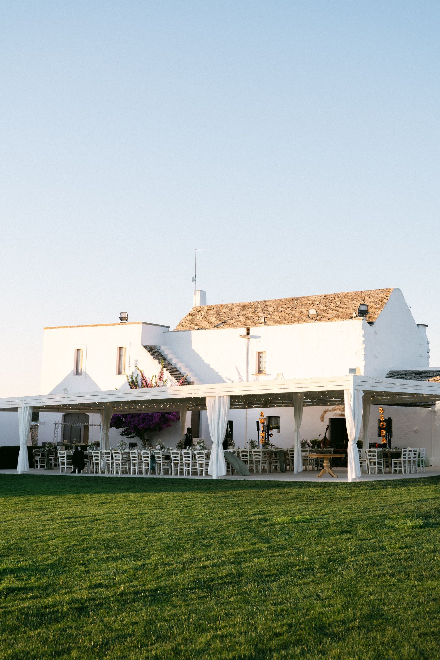 Destination wedding photography in Alberobello, Puglia, captured in digital with a clean and elegant visual style.