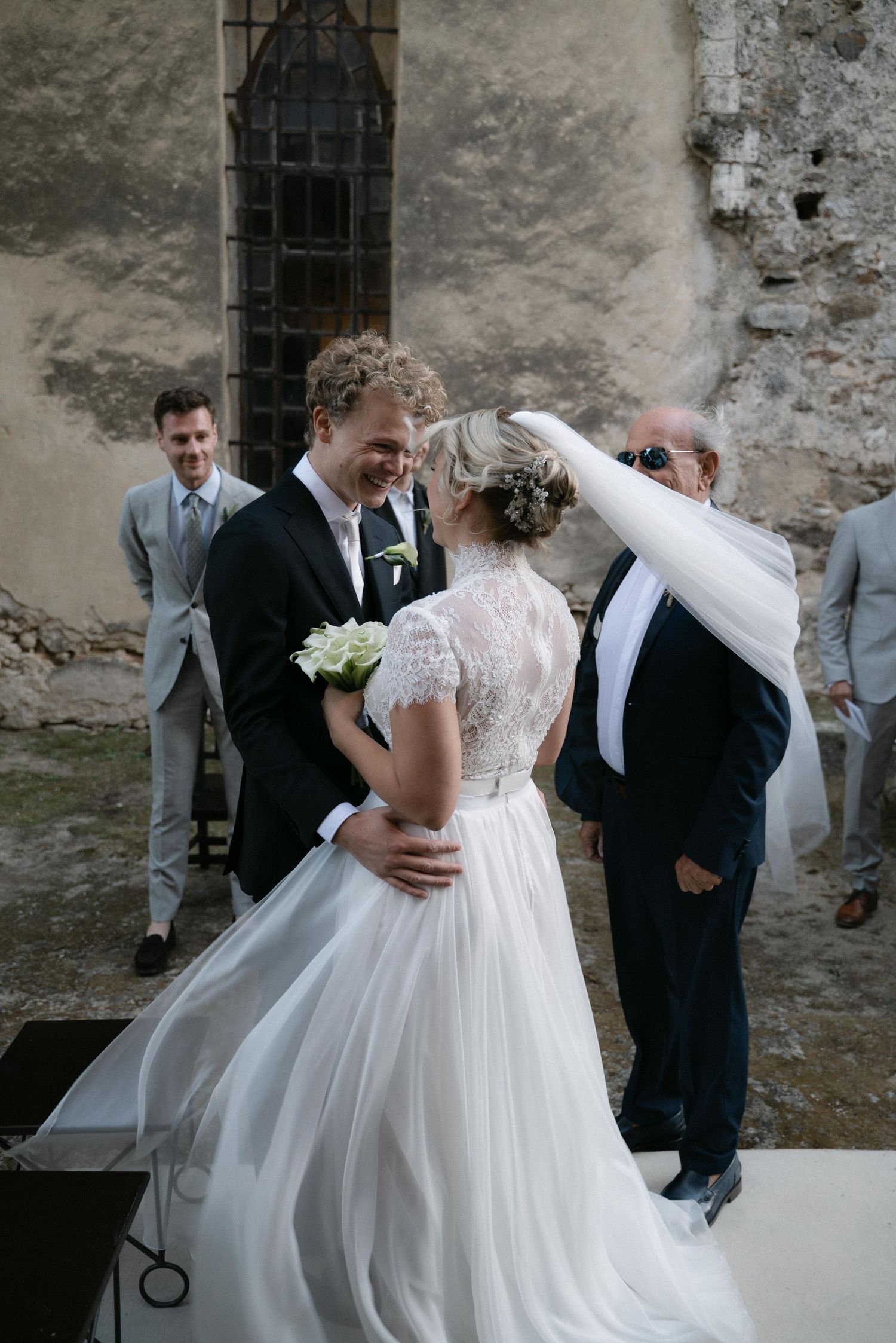 Bride and groom meeting at the beginning of their wedding ceremony