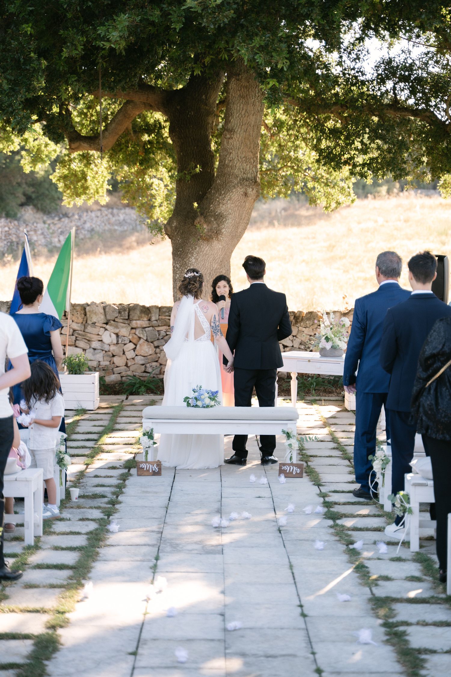 Destination wedding photography in Alberobello, Puglia, captured in digital with a clean and elegant visual style.