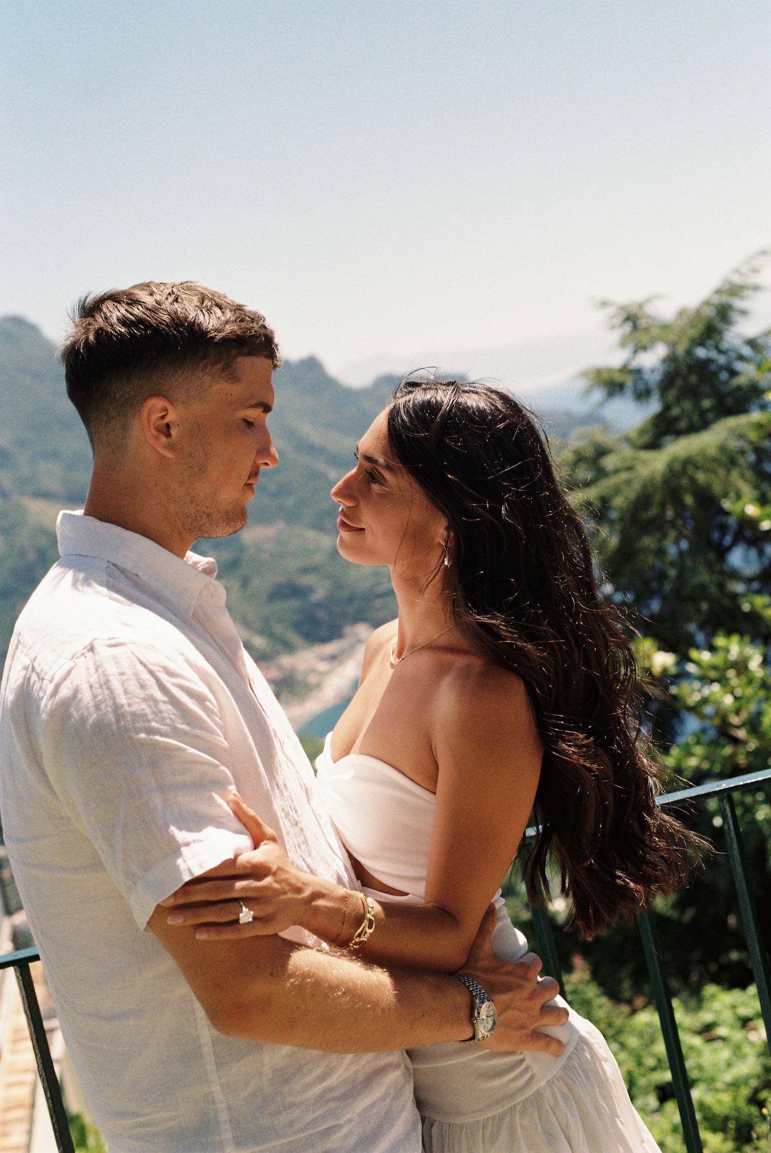 Couple embracing after a surprise proposal on the Amalfi Coast