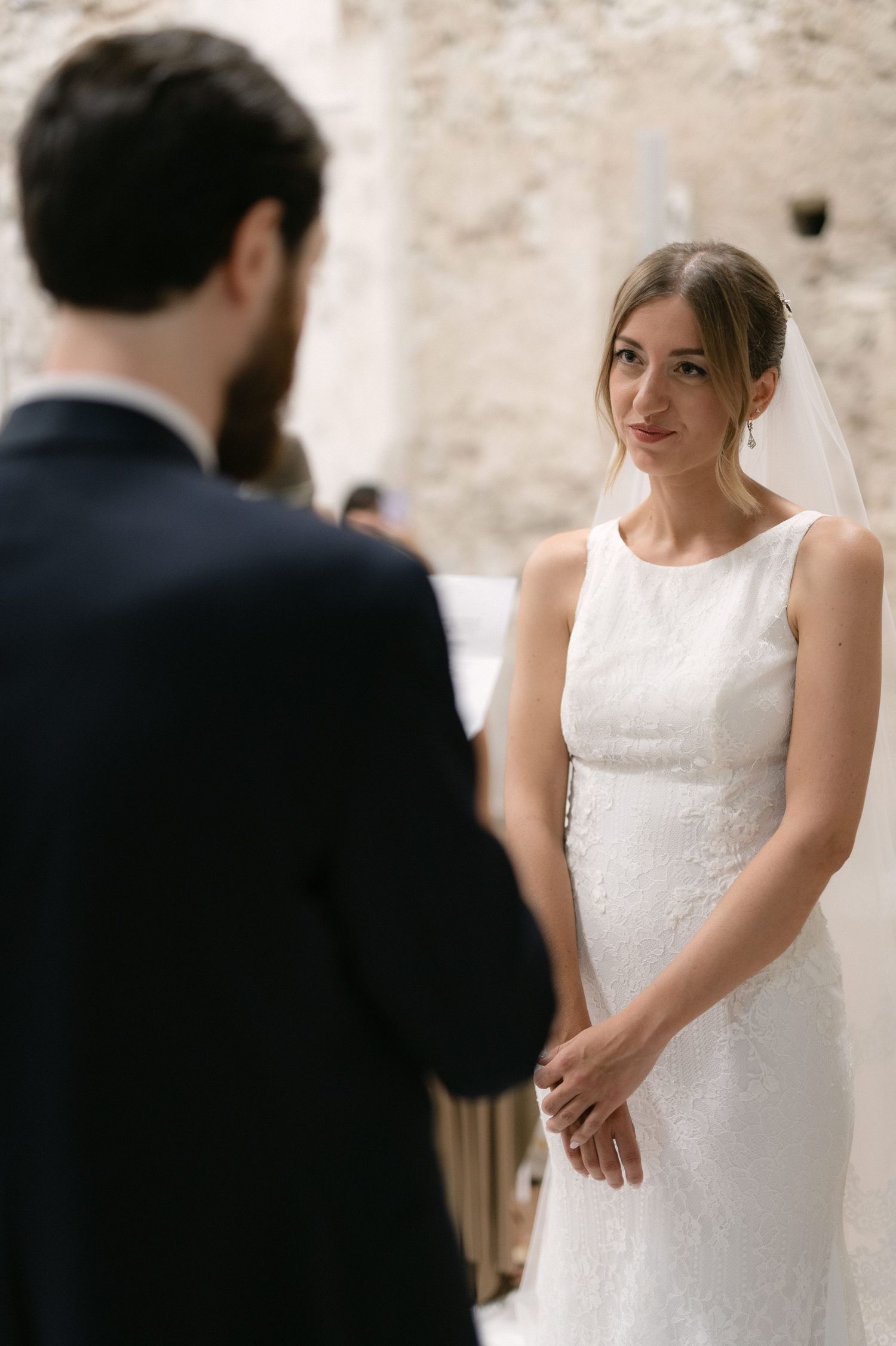 Bride looking at the groom during their wedding ceremony
